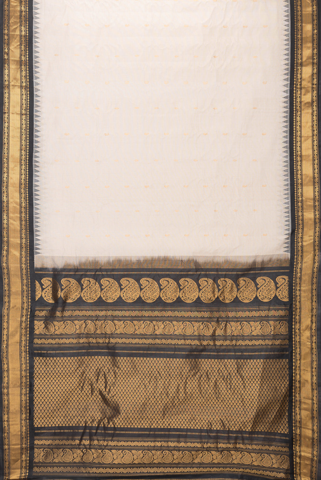 Flat view of Beige Dual Tone Gadwal Silk Saree with Zari Butta on the body and Zari Border. 