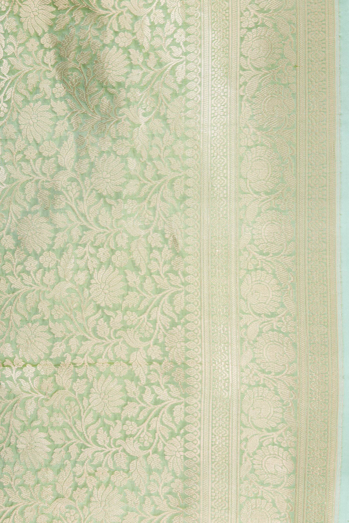 Border image of Sea Green Dual Tone Banarasi Silk Saree with Zari Brocade on the body and Zari Border. 