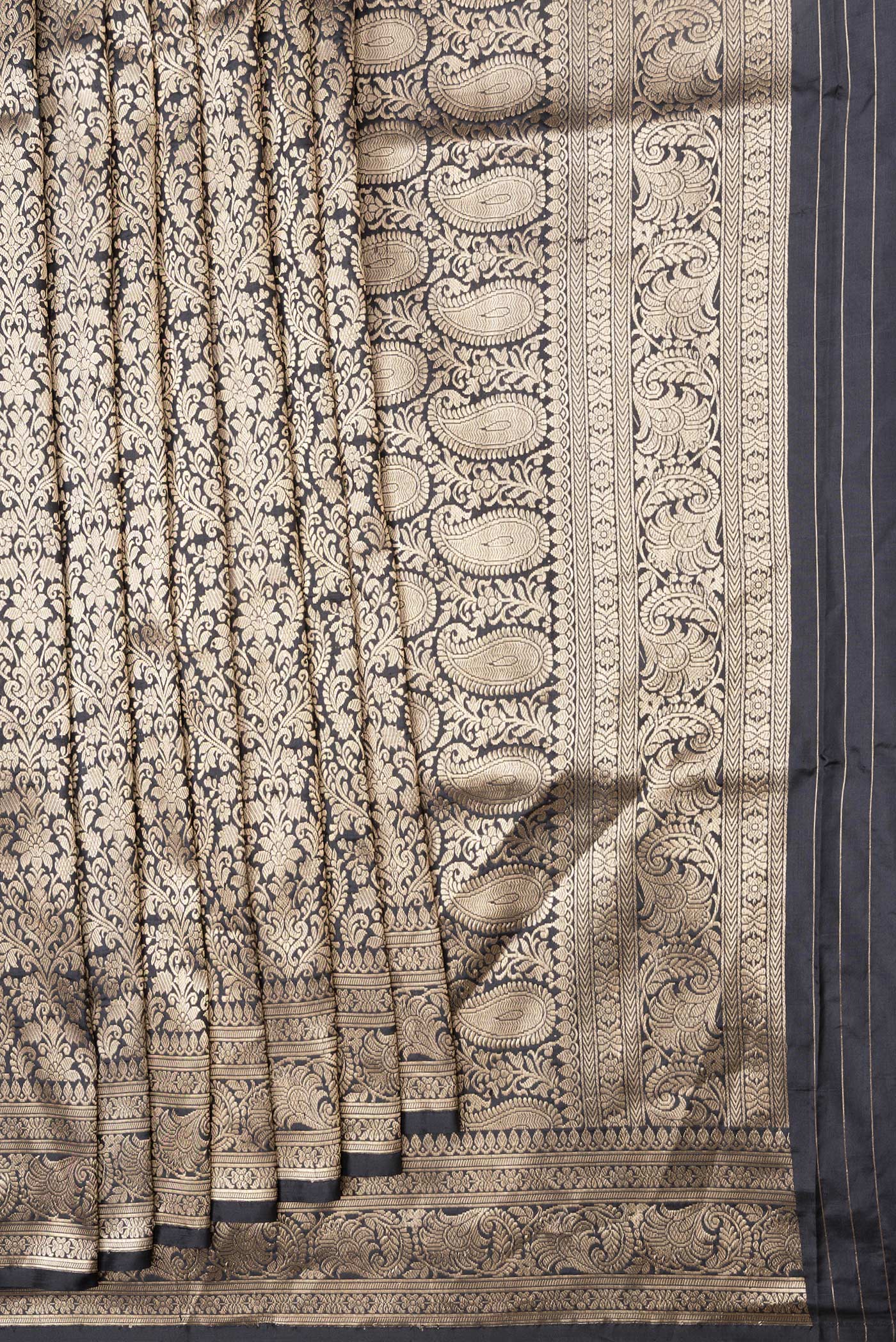 Pleats and pallu of Black Dual Tone Banarasi Silk Saree with Zari Brocade on the body and Zari Border. 