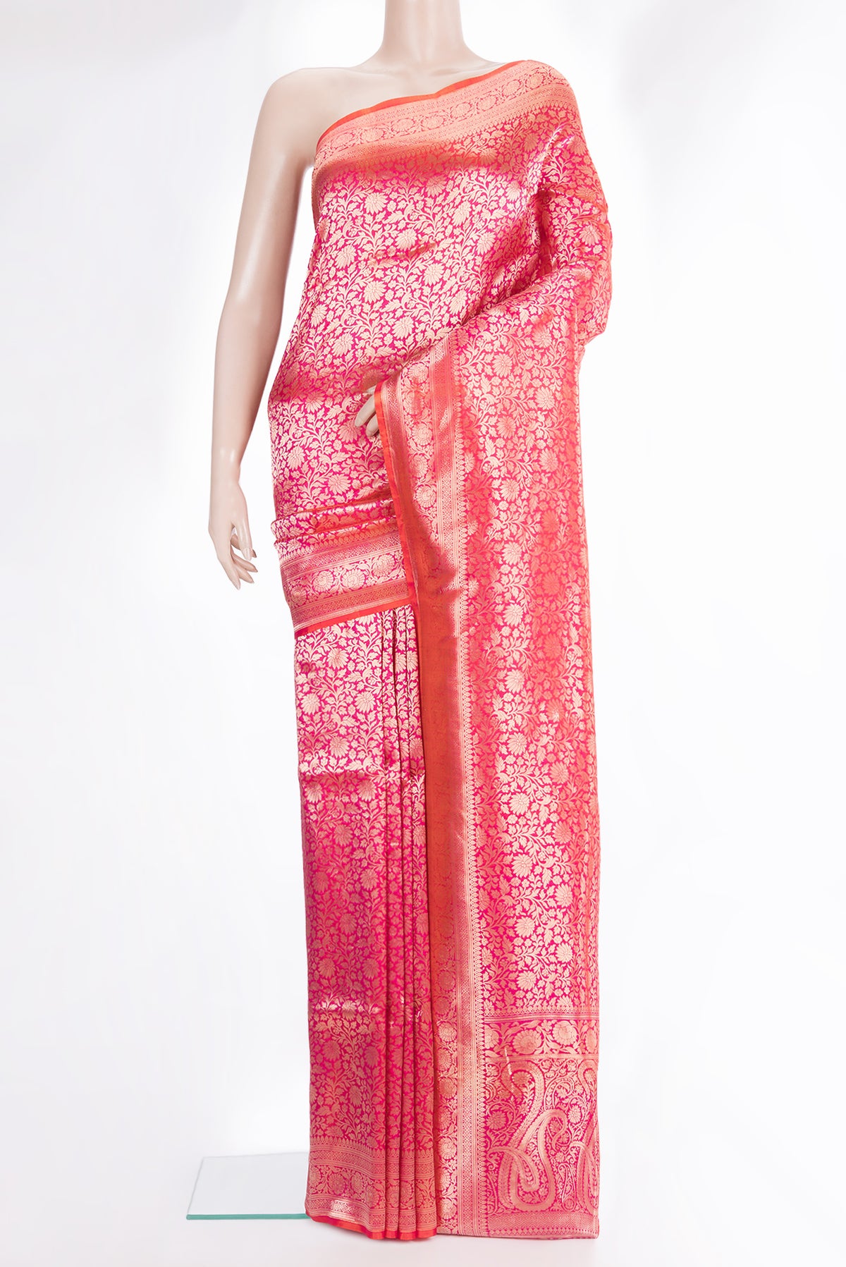 Pure Silk Coral Dual Tone Banarasi Saree with Zari Brocade on the body and Zari Border.  displayed on a mannequin