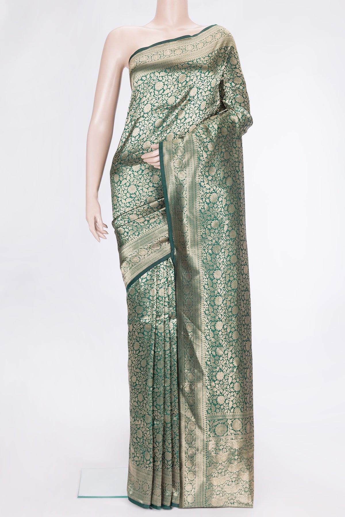 Green Dual Tone Banarasi Silk Saree with Zari Brocade on the body and Zari Border.  displayed on a mannequin