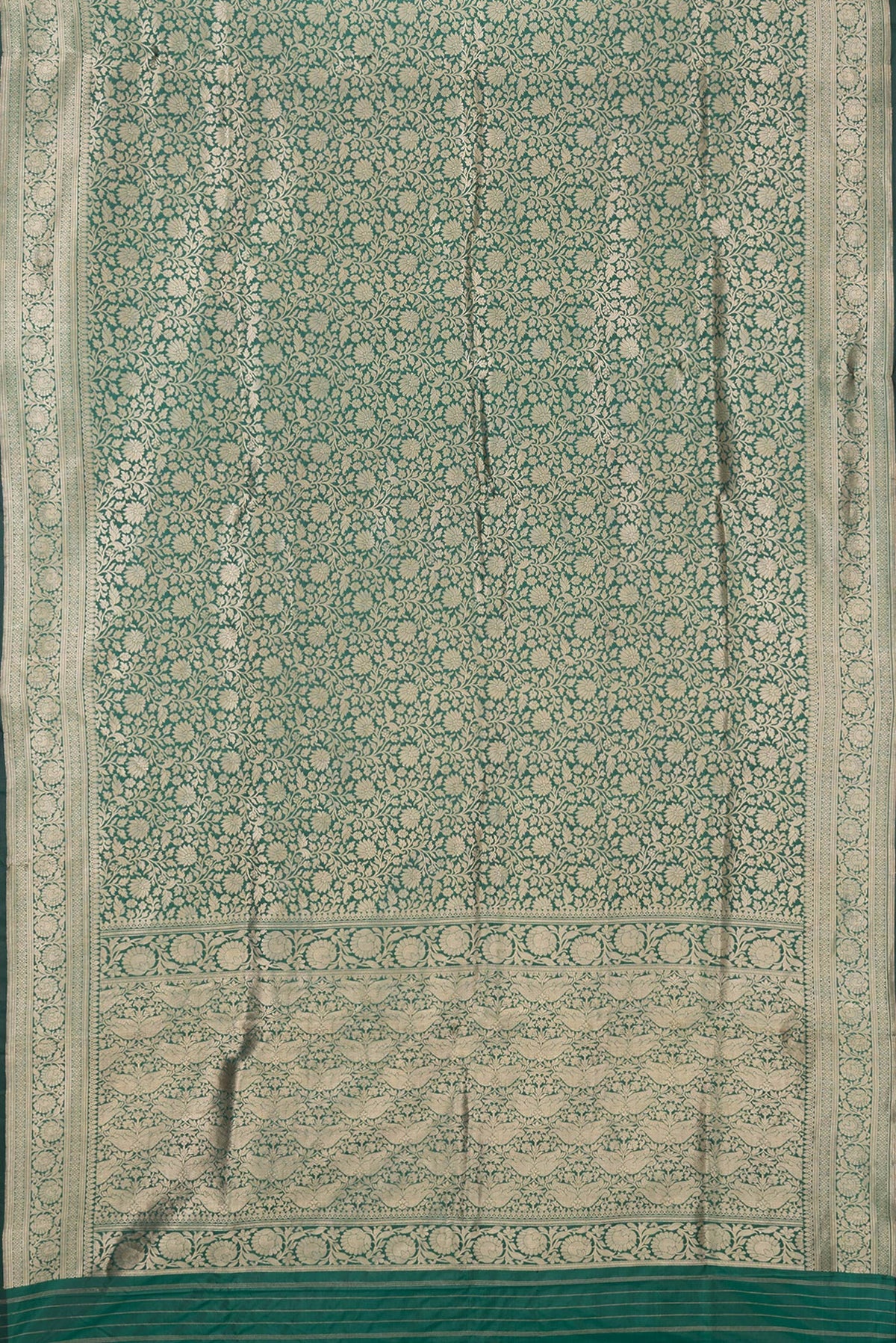 Flat view of Green Dual Tone Banarasi Silk Saree with Zari Brocade on the body and Zari Border. 