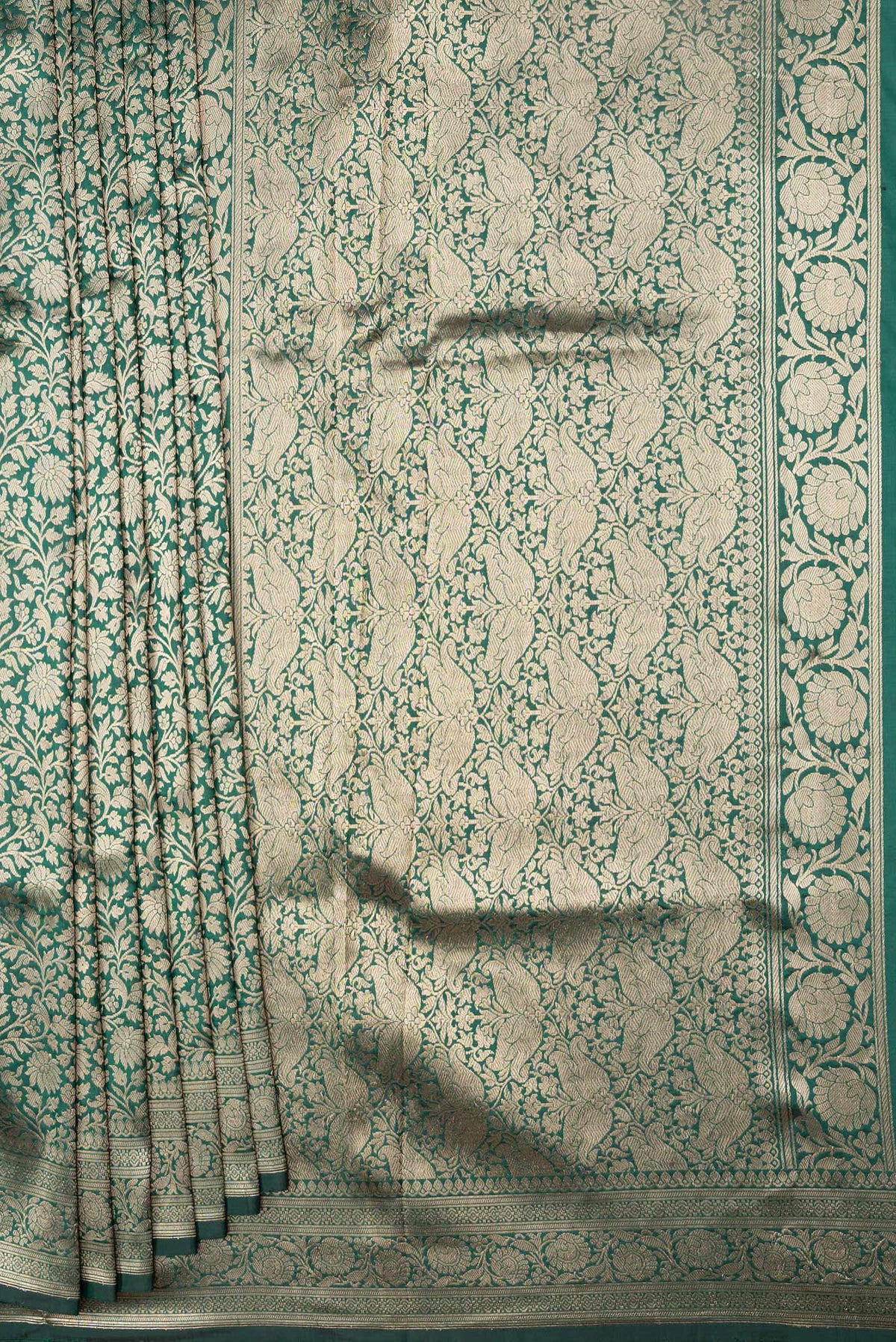 Pleats and pallu of Green Dual Tone Banarasi Silk Saree with Zari Brocade on the body and Zari Border. 