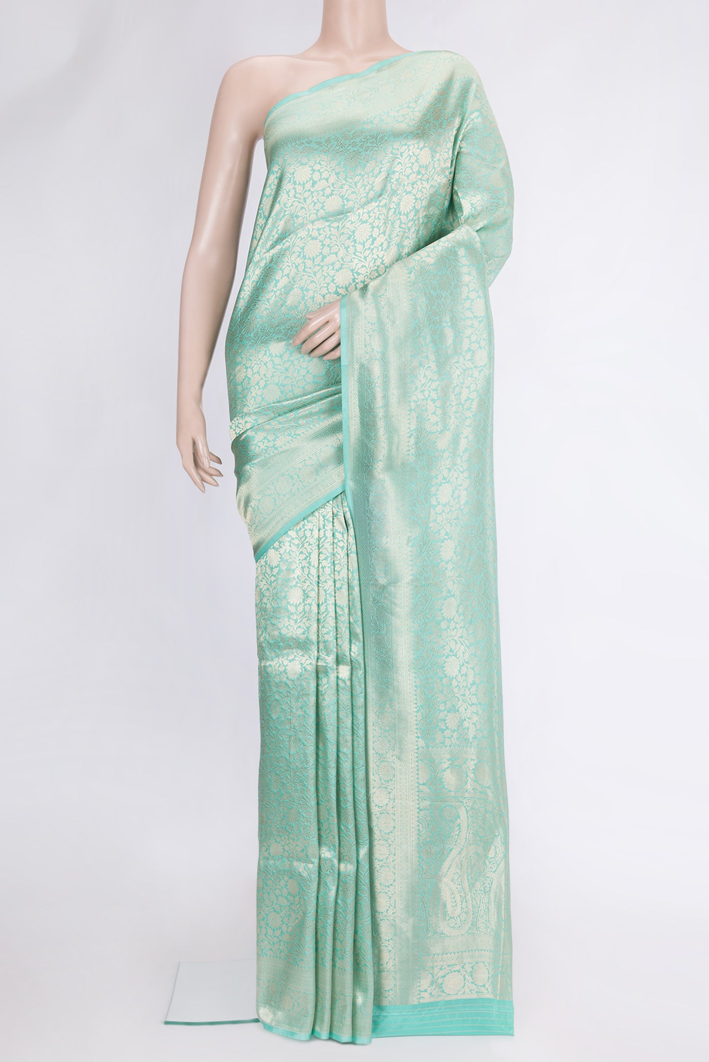 Light Blue Dual Tone Banarasi Silk Saree with Zari Brocade on the body and Zari Border.  displayed on a mannequin