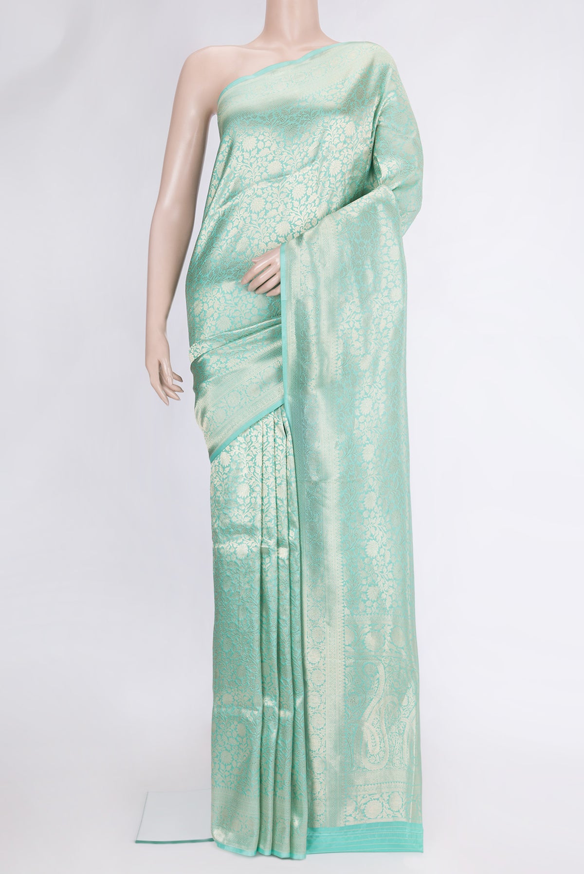 Light Blue Dual Tone Banarasi Silk Saree with Zari Brocade on the body and Zari Border.  displayed on a mannequin