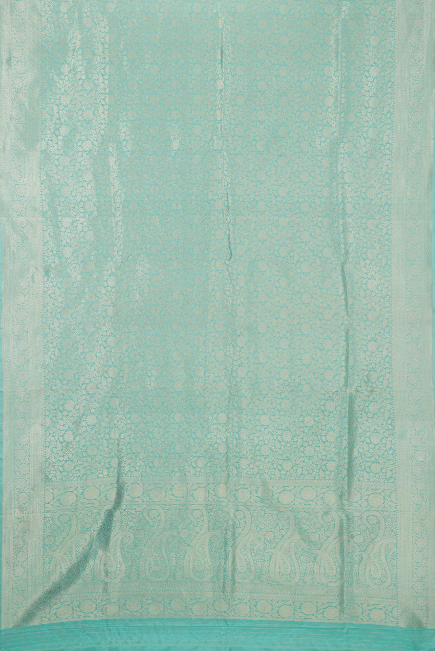 Flat view of Light Blue Dual Tone Banarasi Silk Saree with Zari Brocade on the body and Zari Border. 