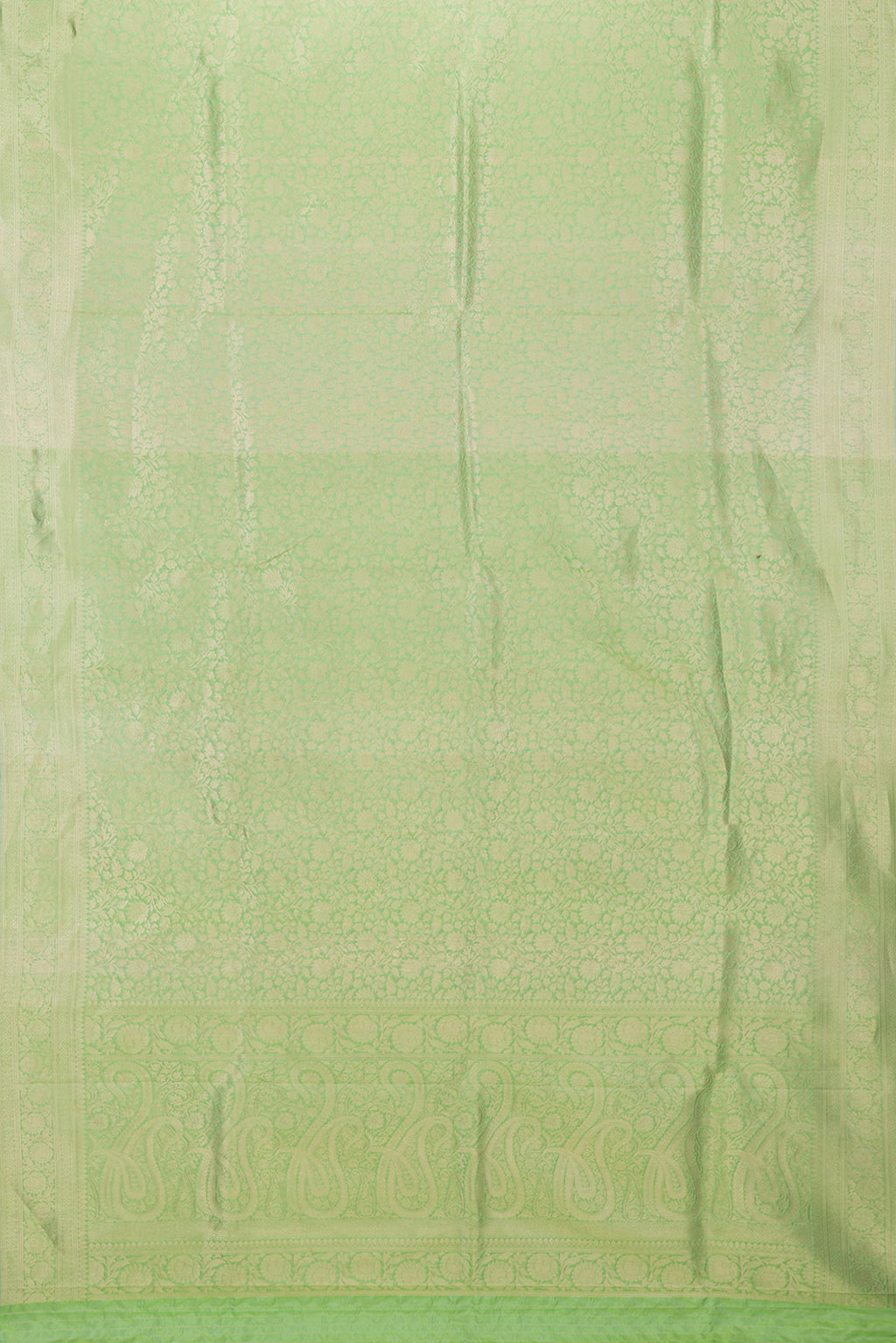 Flat view of Pista Green Dual Tone Banarasi Silk Saree with Zari Brocade on the body and Zari Border. 