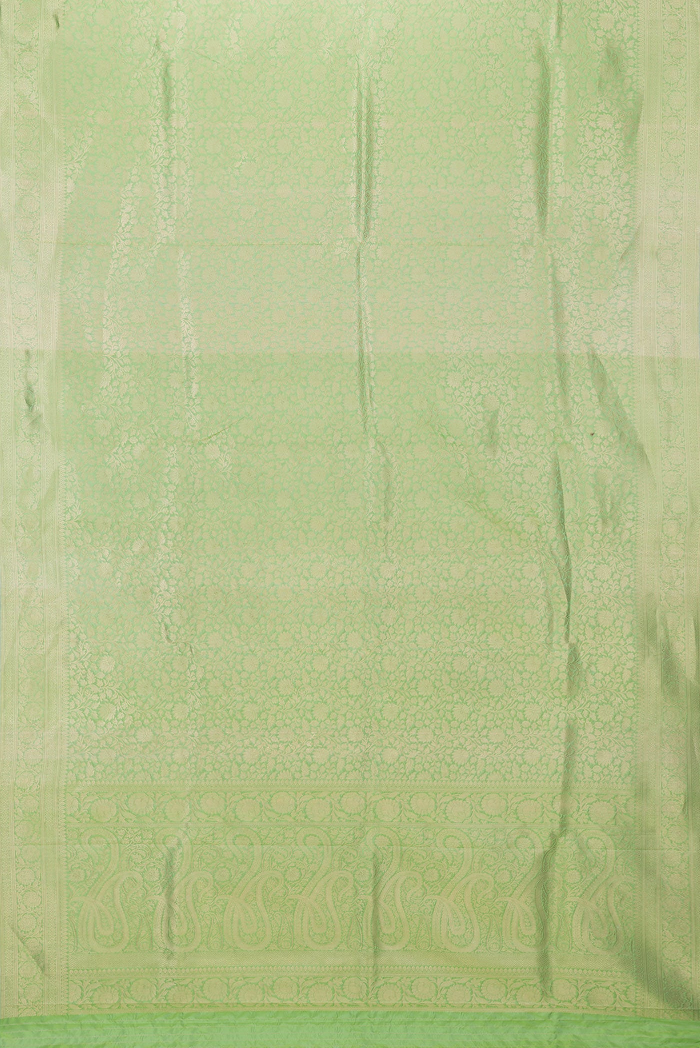 Flat view of Pista Green Dual Tone Banarasi Silk Saree with Zari Brocade on the body and Zari Border. 