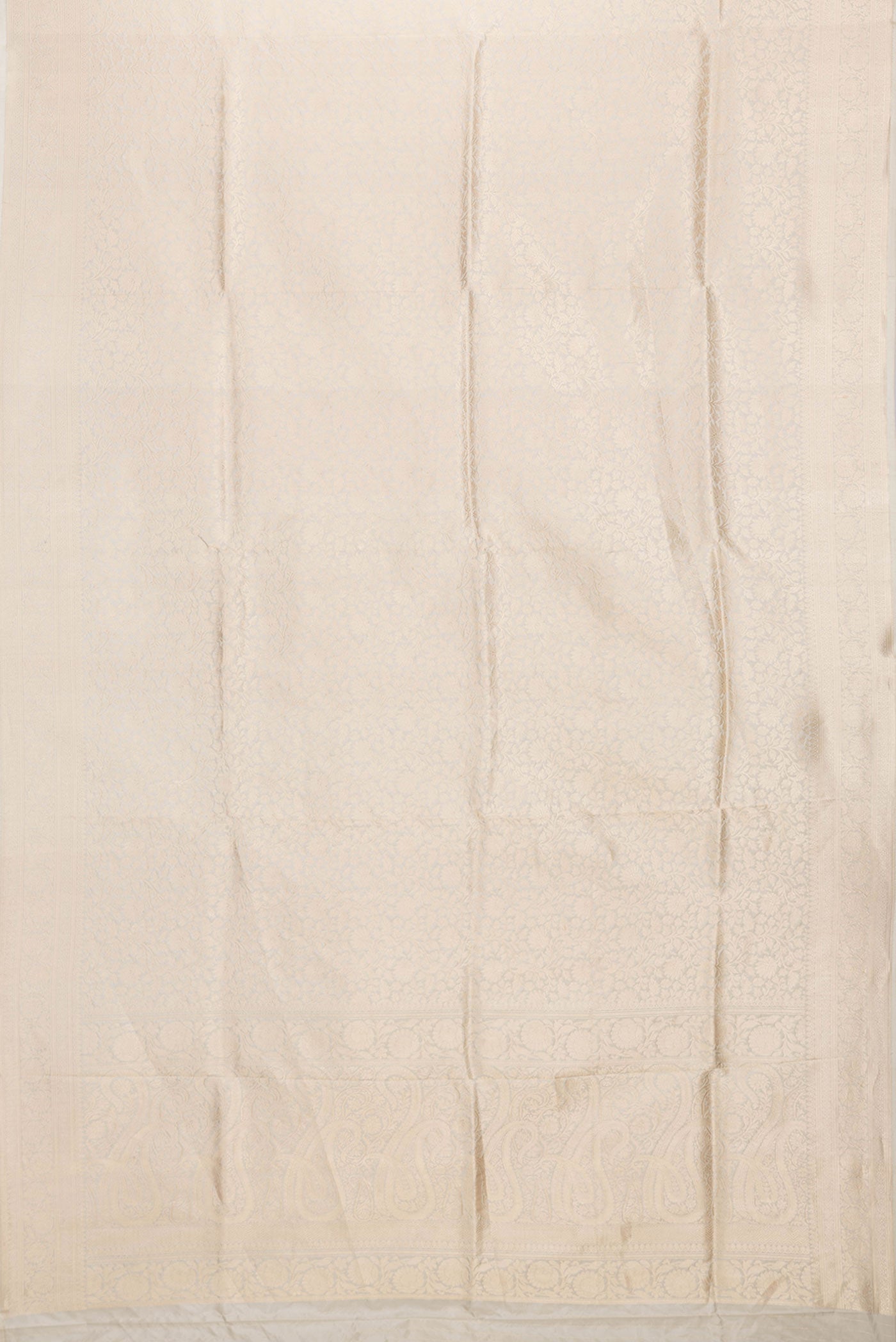 Flat view of Beige Dual Tone Banarasi Silk Saree with Zari Brocade on the body and Zari Border. 