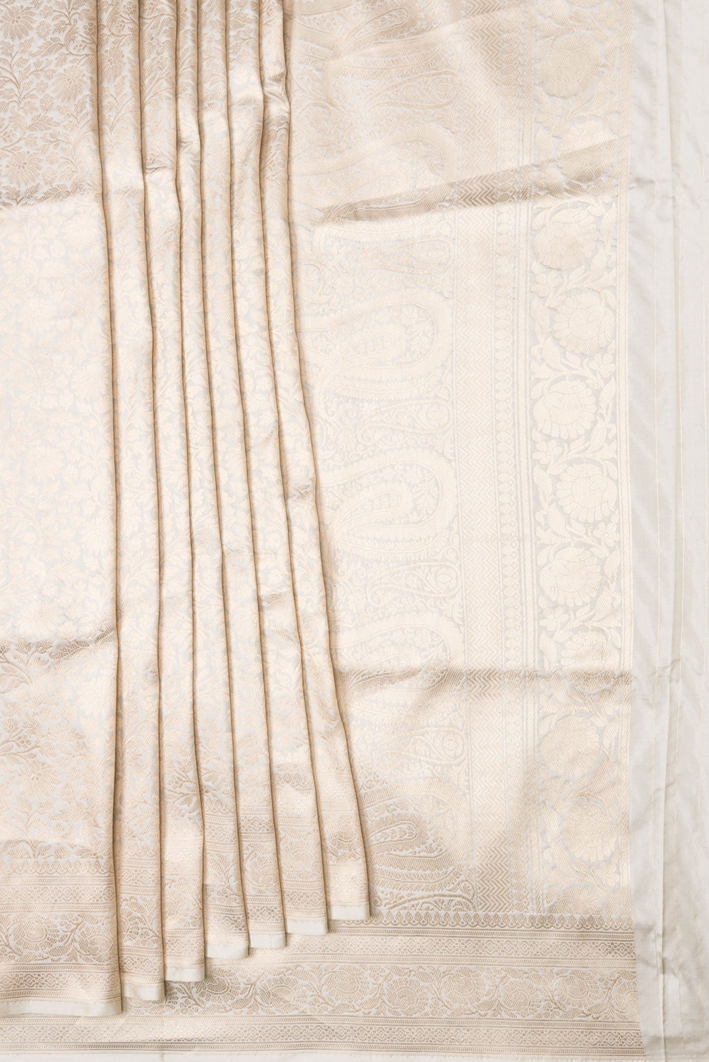 Pleats and pallu of Beige Dual Tone Banarasi Silk Saree with Zari Brocade on the body and Zari Border. 