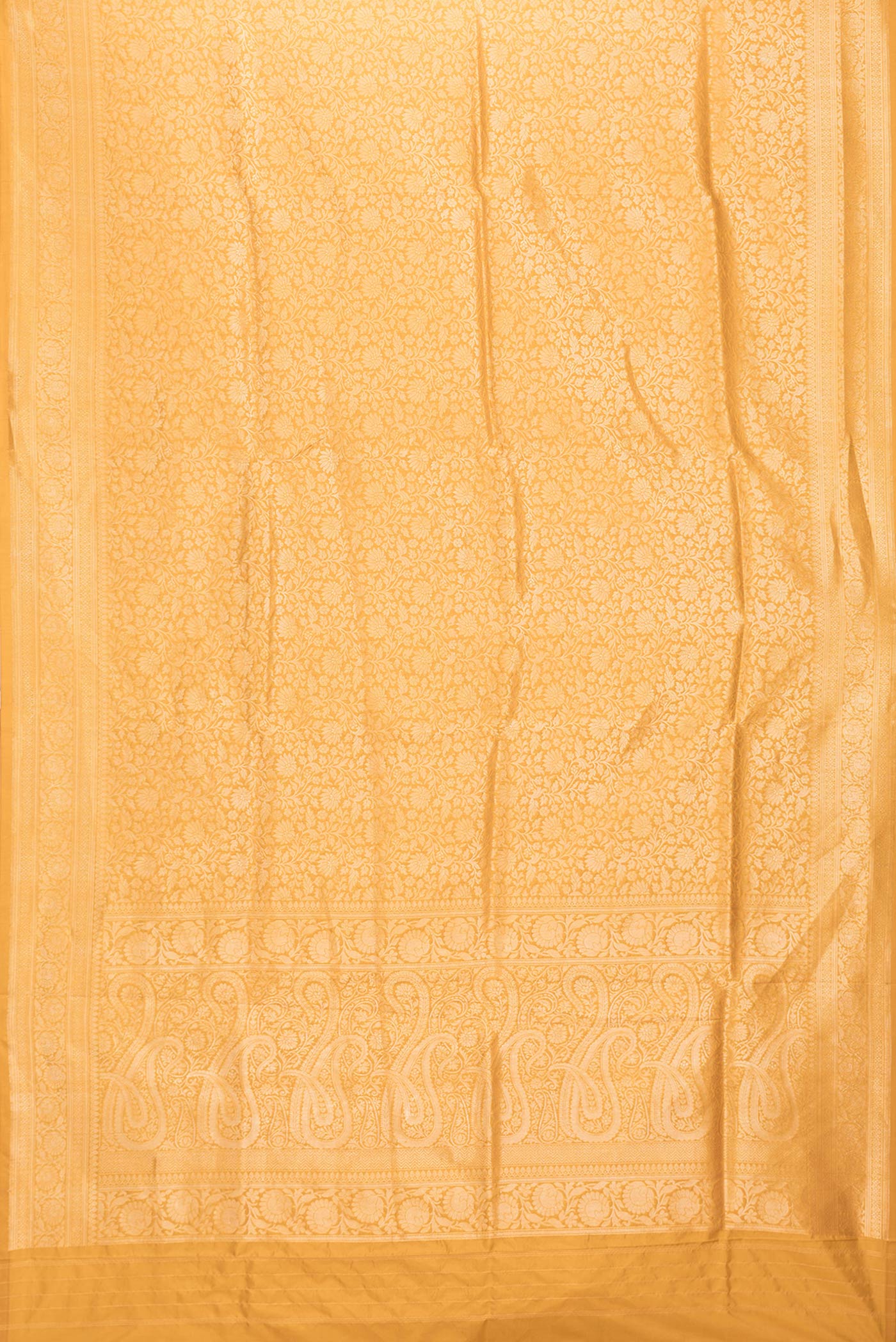Flat view of Mustard Dual Tone Banarasi Silk Saree with Zari Brocade on the body and Zari Border. 