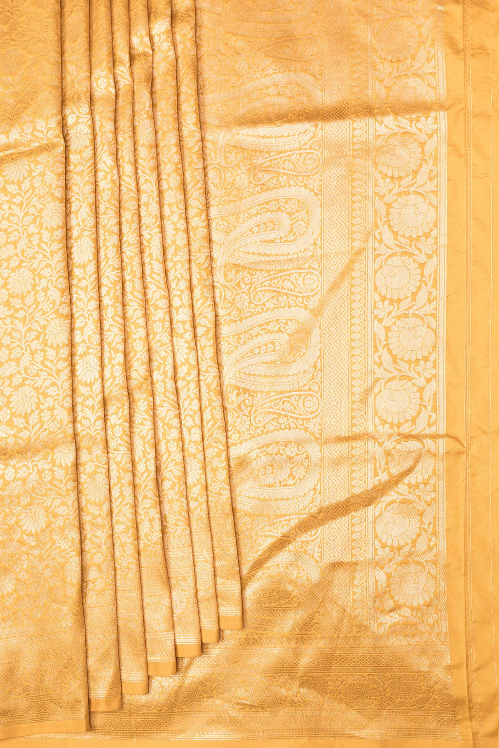 Pleats and pallu of Mustard Dual Tone Banarasi Silk Saree with Zari Brocade on the body and Zari Border. 