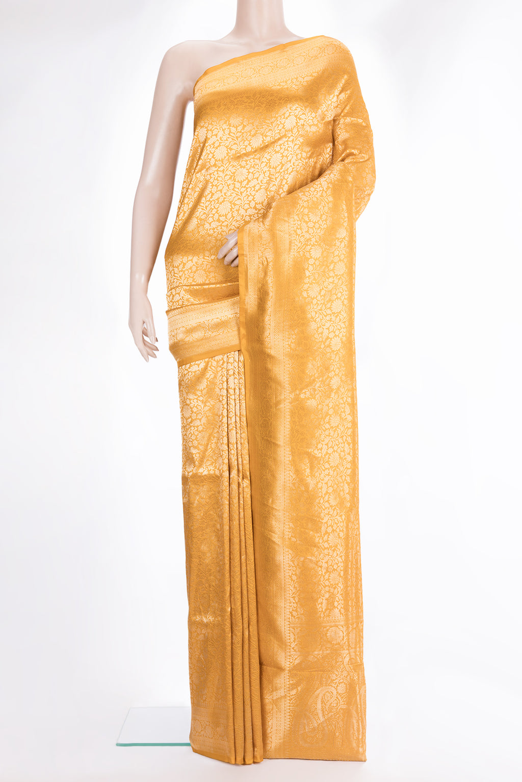 Pure Silk Mustard Banarasi Saree with Zari Brocade on the body and Zari Border.  displayed on a mannequin