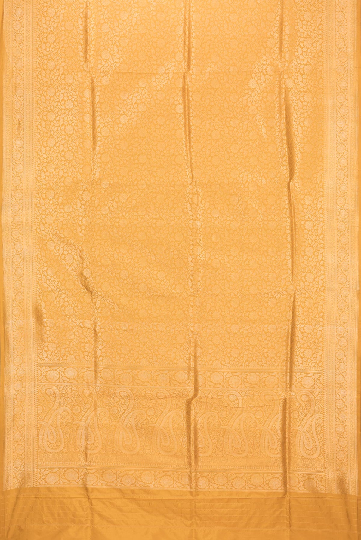 Flat view of Pure Silk Mustard Banarasi Saree with Zari Brocade on the body and Zari Border. 