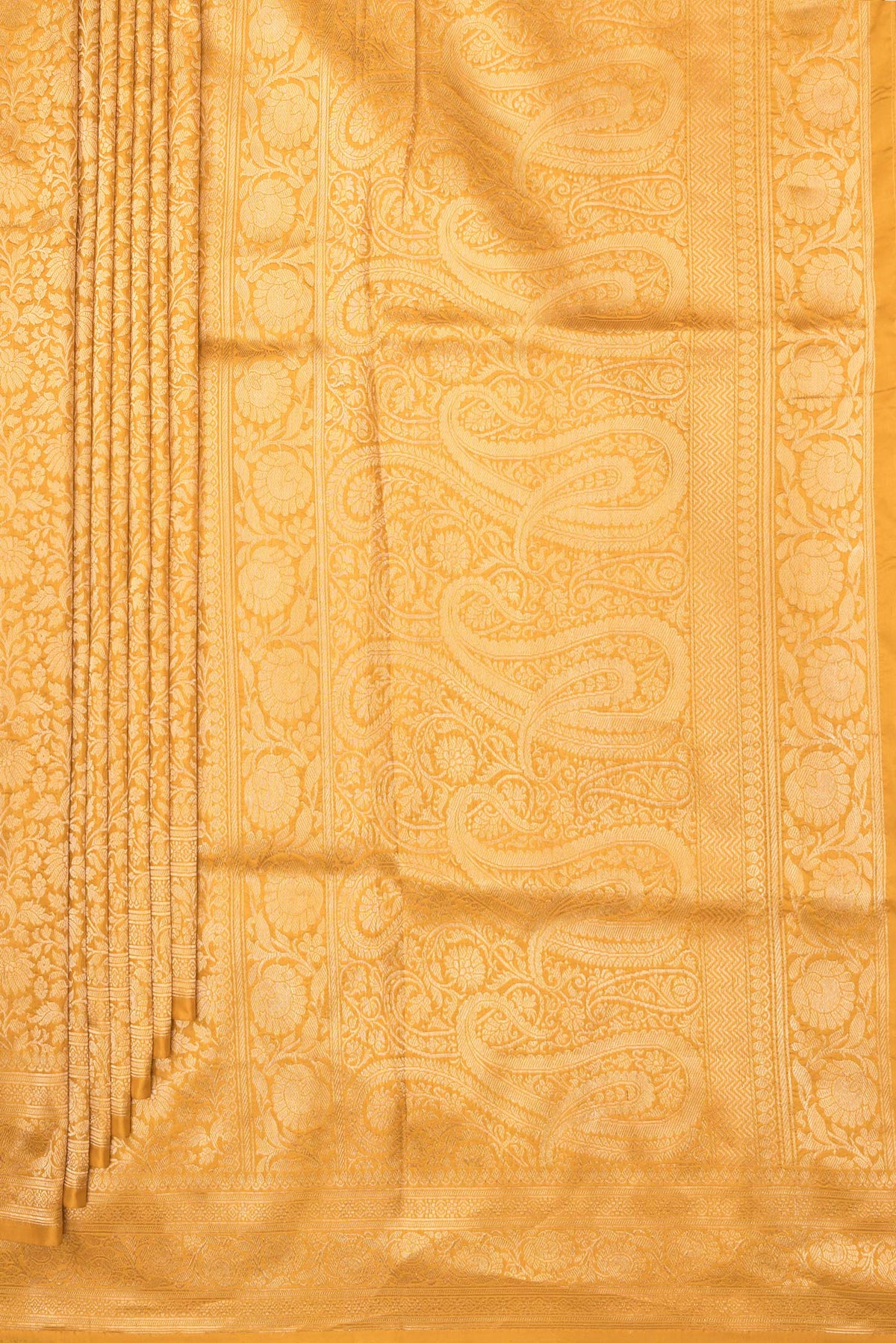 Pleats and pallu of Pure Silk Mustard Banarasi Saree with Zari Brocade on the body and Zari Border. 