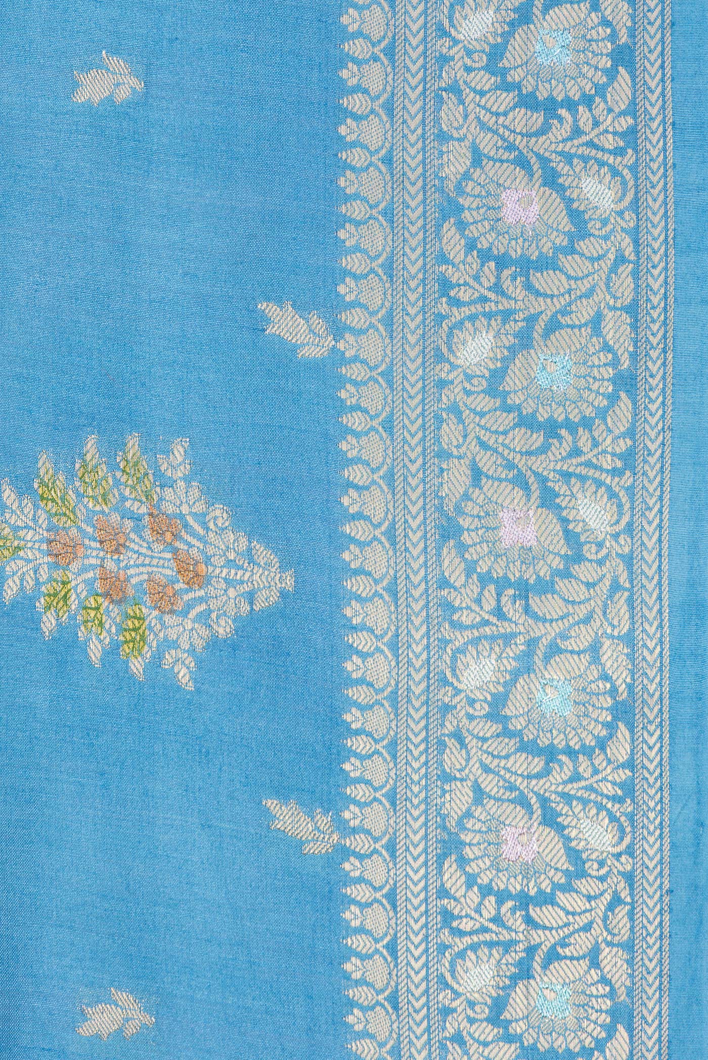 Border image of Sky Blue Dual Tone Tussar Silk Saree with Zari Butta on the body and Zari Border. 