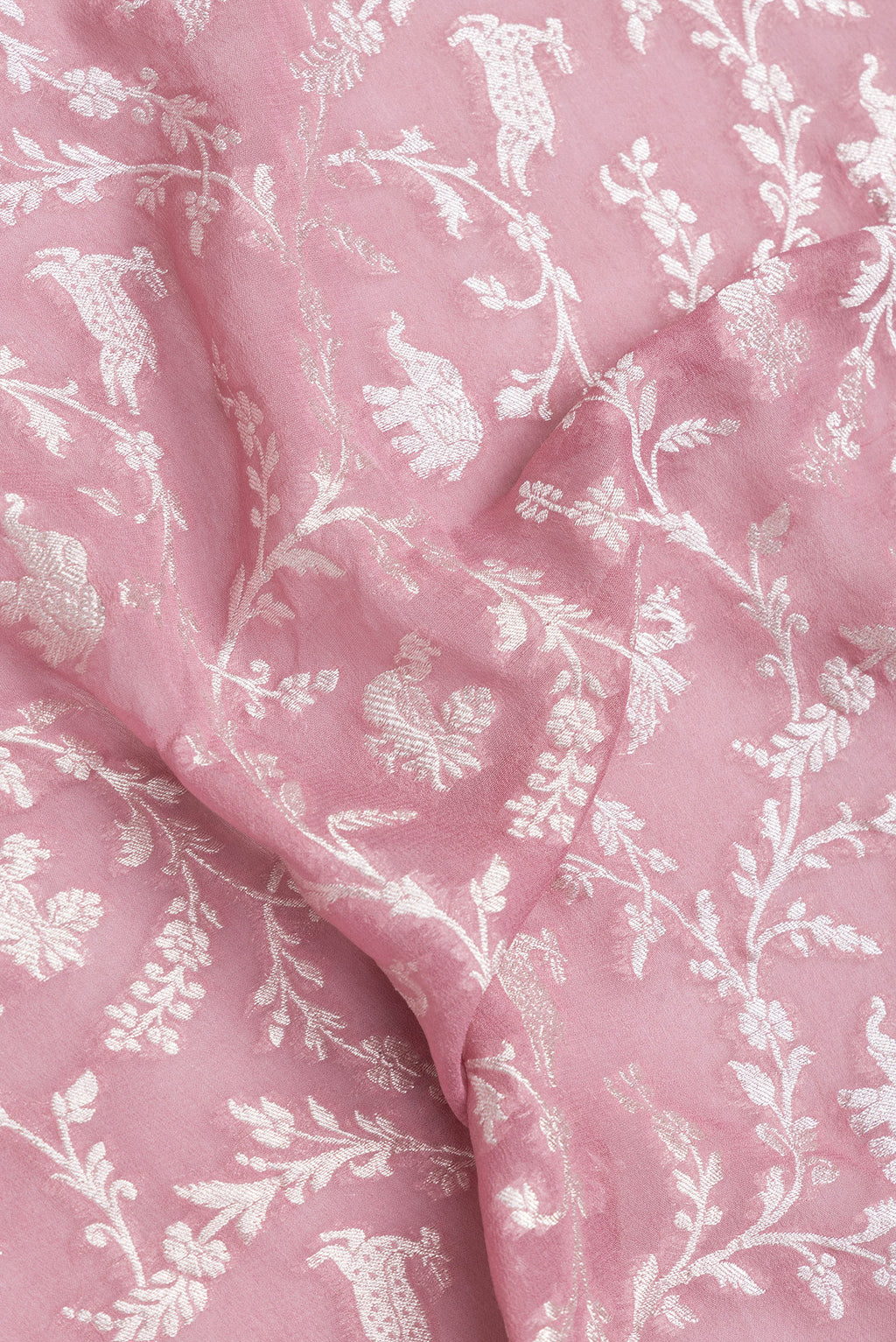 Close up of Pink Dual Tone Banarasi Georgette Saree with Zari Brocade on the body and Zari Border.  displaying folds