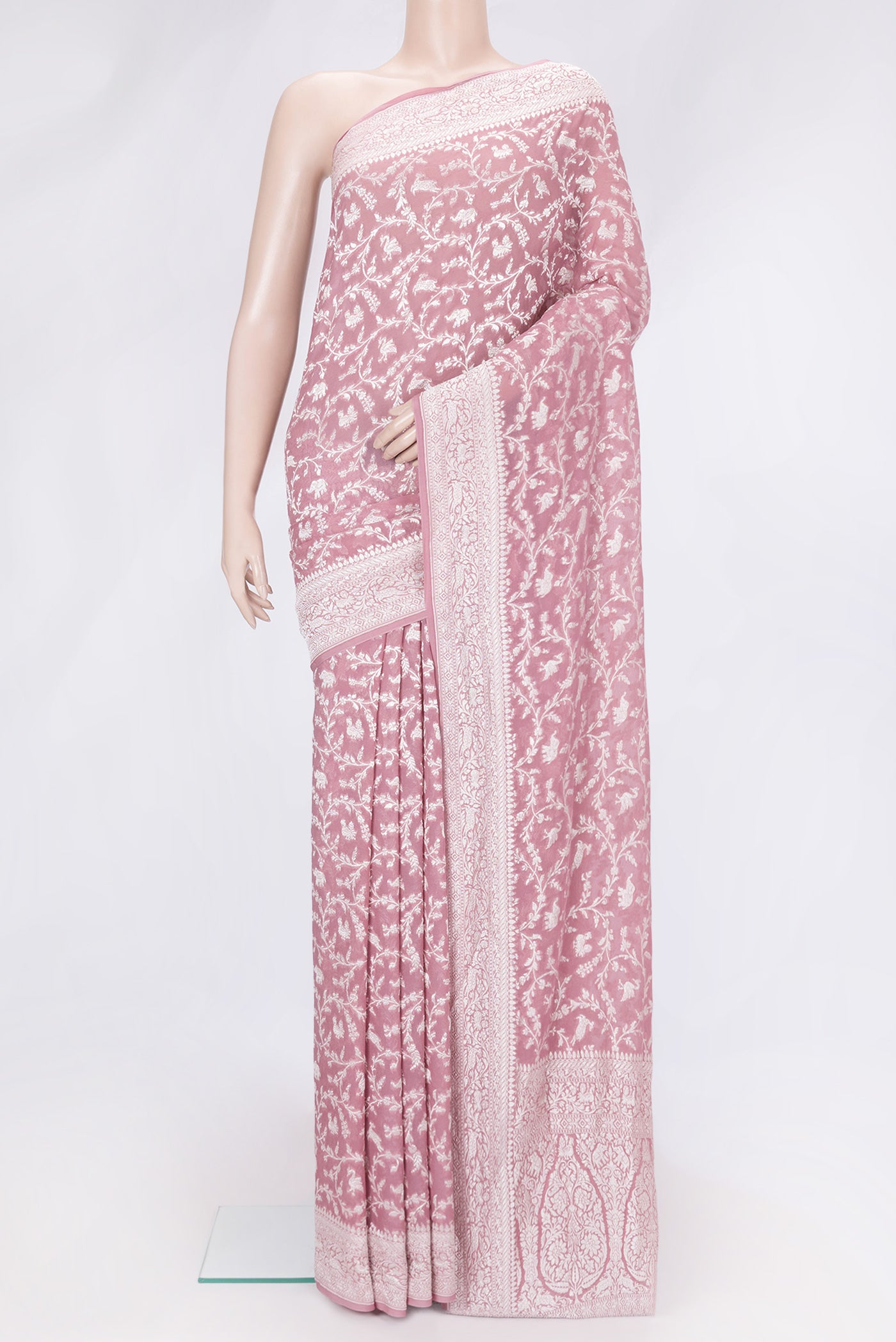 Pink Dual Tone Banarasi Georgette Saree with Zari Brocade on the body and Zari Border.  displayed on a mannequin