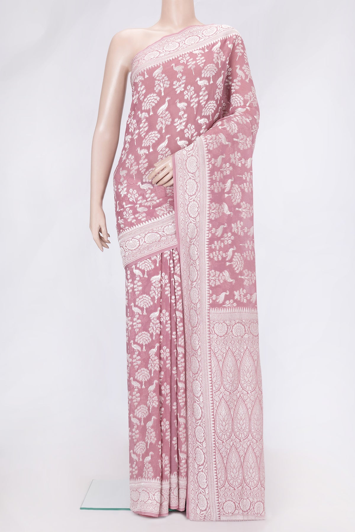 Pink Dual Tone Banarasi Georgette Saree with Zari Brocade on the body and Zari Border.  displayed on a mannequin