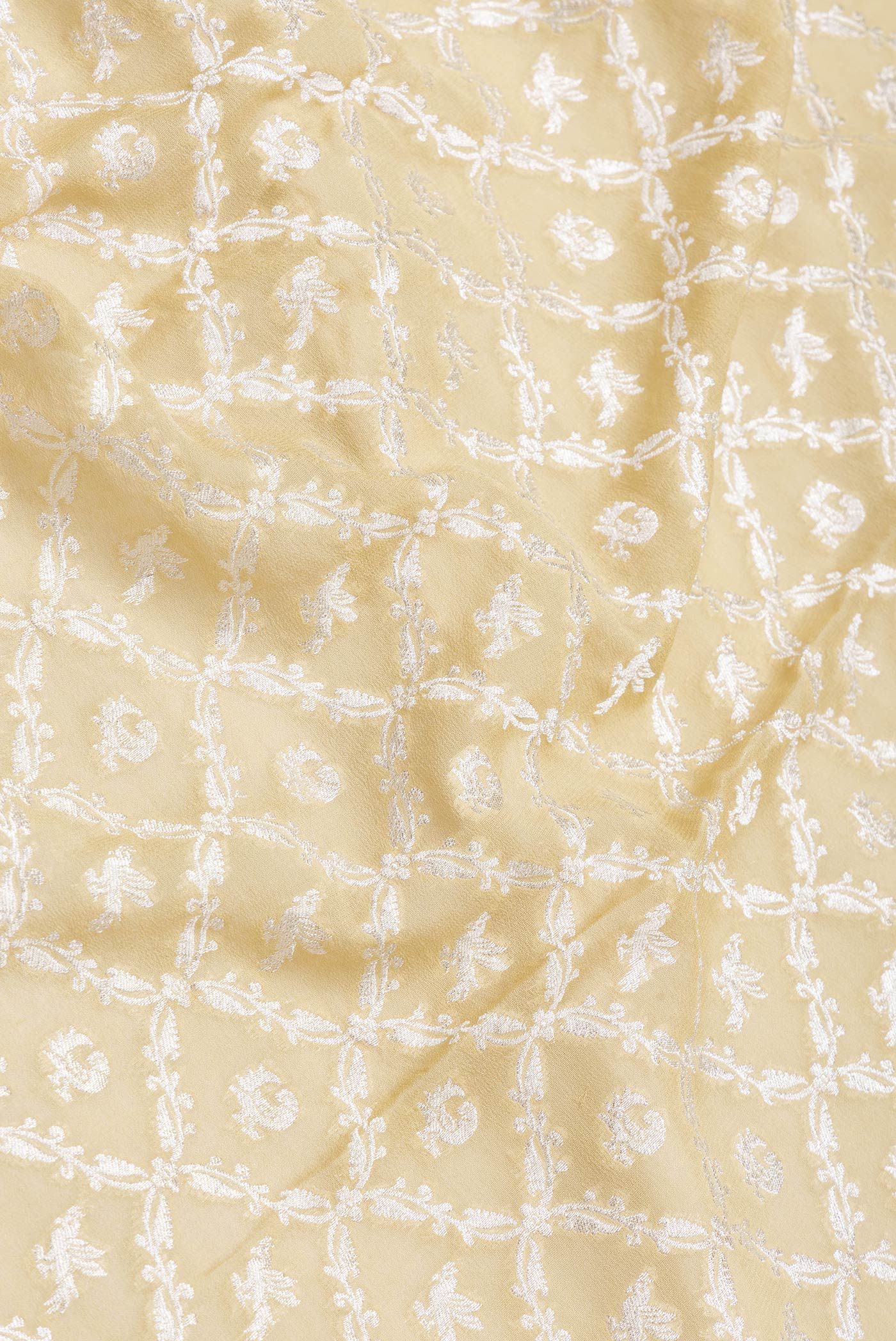 Close up of Sandal Dual Tone Banarasi Georgette Saree with Zari Brocade on the body and Zari Border.  displaying folds