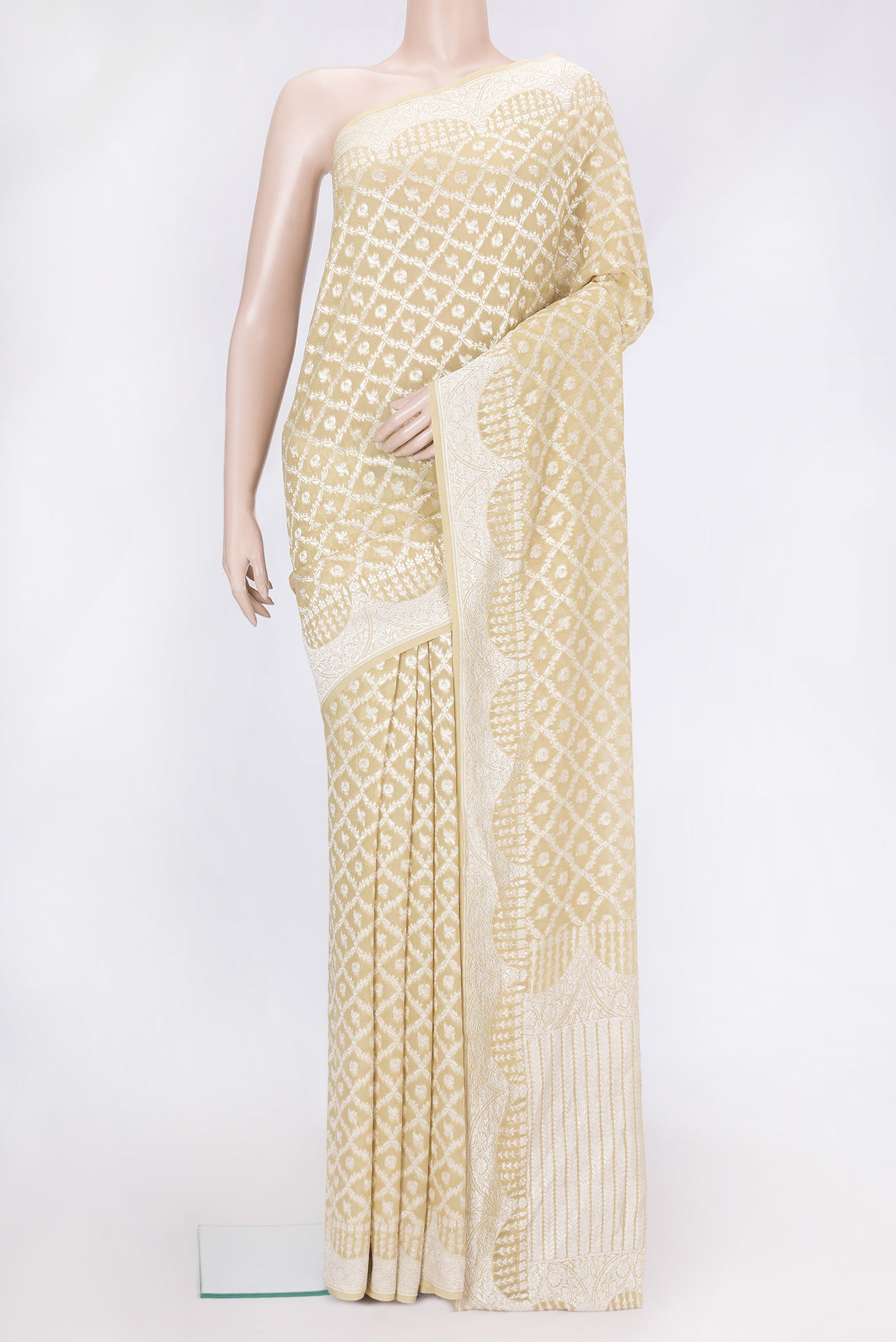 Sandal Dual Tone Banarasi Georgette Saree with Zari Brocade on the body and Zari Border.  displayed on a mannequin