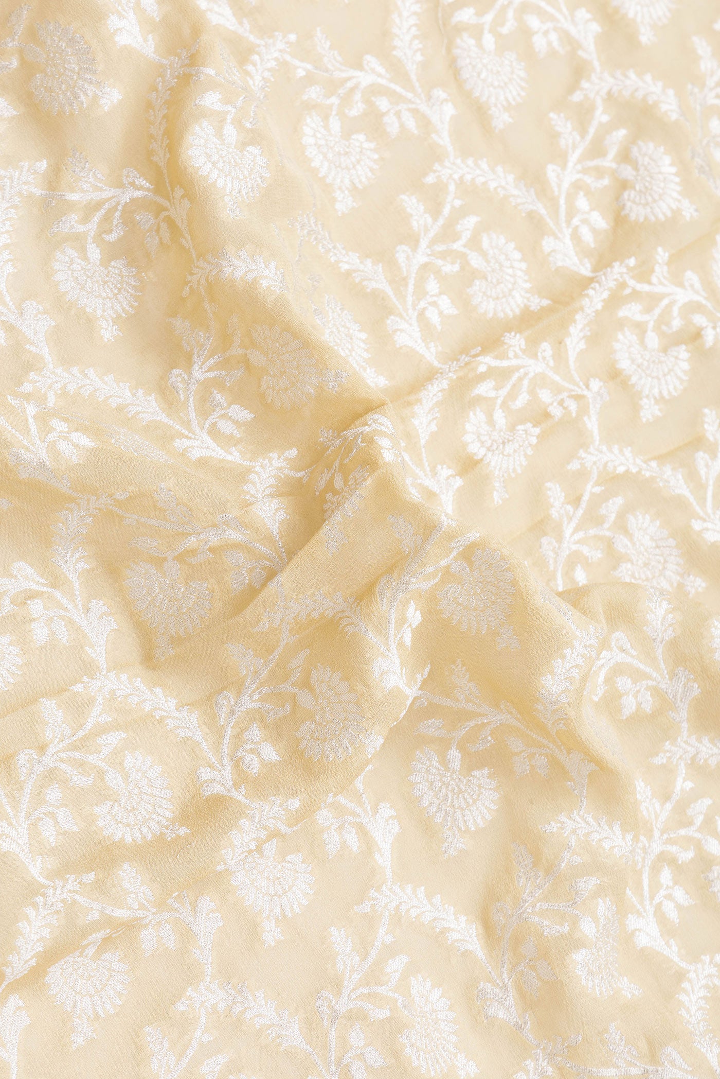 Close up of Sandal Dual Tone Banarasi Georgette Saree with Zari Brocade on the body and Zari Border.  displaying folds