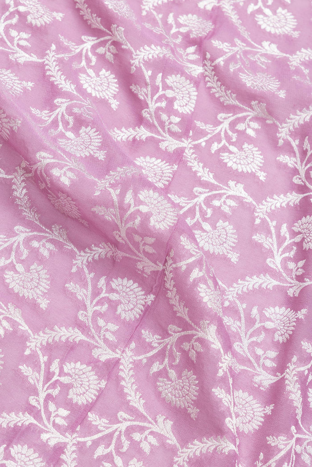 Close up of Lavender Dual Tone Banarasi Georgette Saree with Zari Brocade on the body and Zari Border.  displaying folds