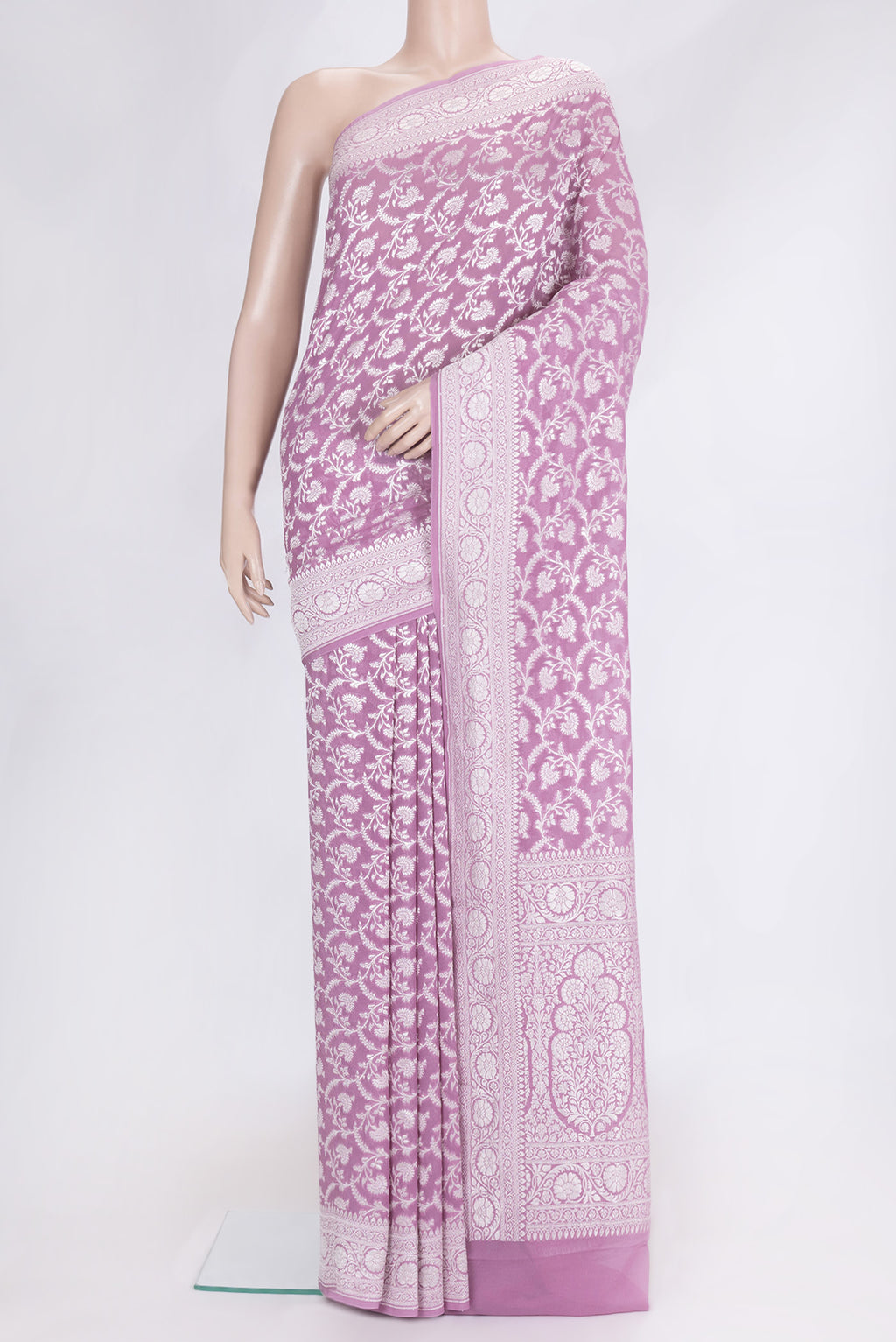 Lavender Dual Tone Banarasi Georgette Saree with Zari Brocade on the body and Zari Border.  displayed on a mannequin