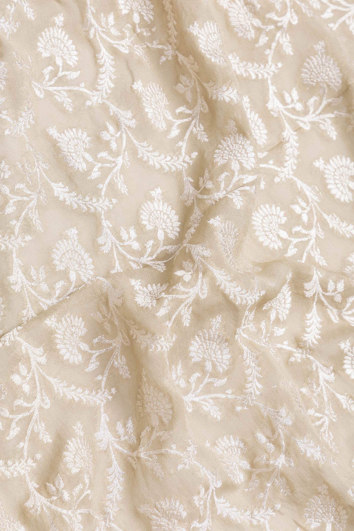 Close up of Mehandi Green Dual Tone Banarasi Georgette Saree with Zari Brocade on the body and Zari Border.  displaying folds