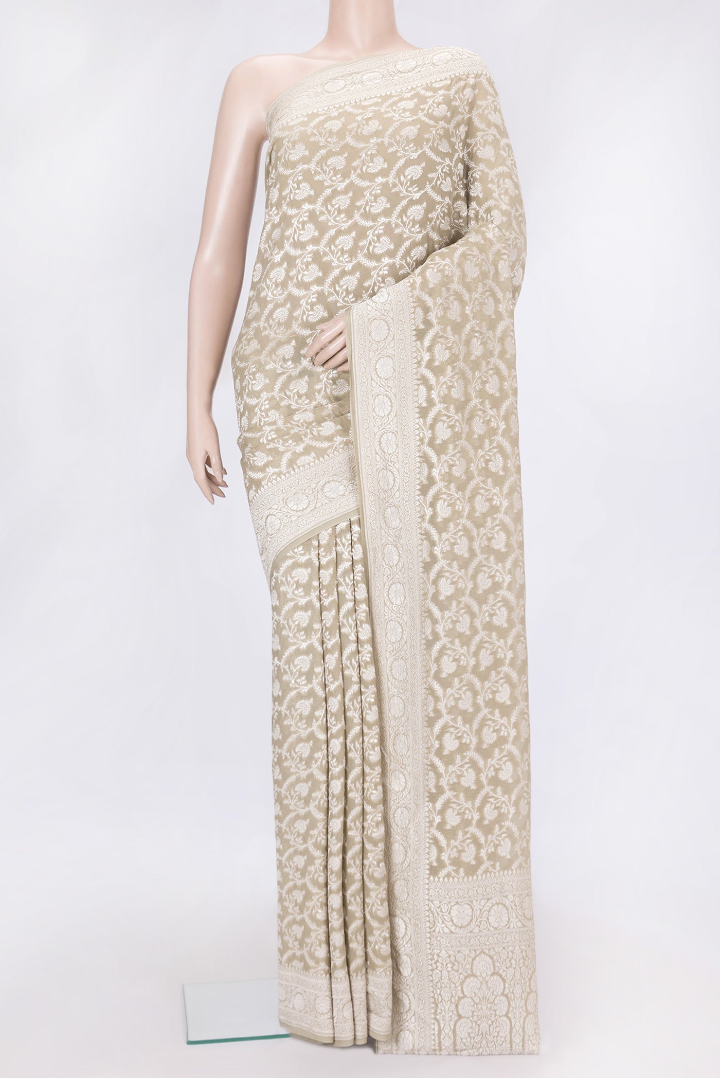Mehandi Green Dual Tone Banarasi Georgette Saree with Zari Brocade on the body and Zari Border.  displayed on a mannequin