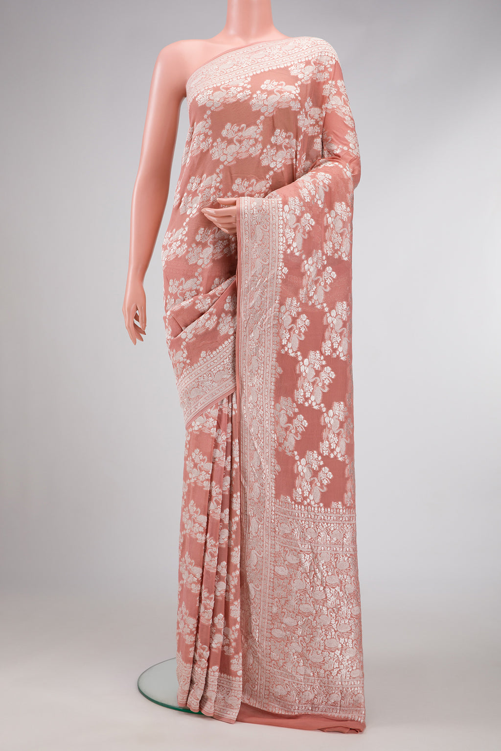 Brown Dual Tone Mysore Georgette Saree with Zari Brocade on the body and Zari Border.  displayed on a mannequin