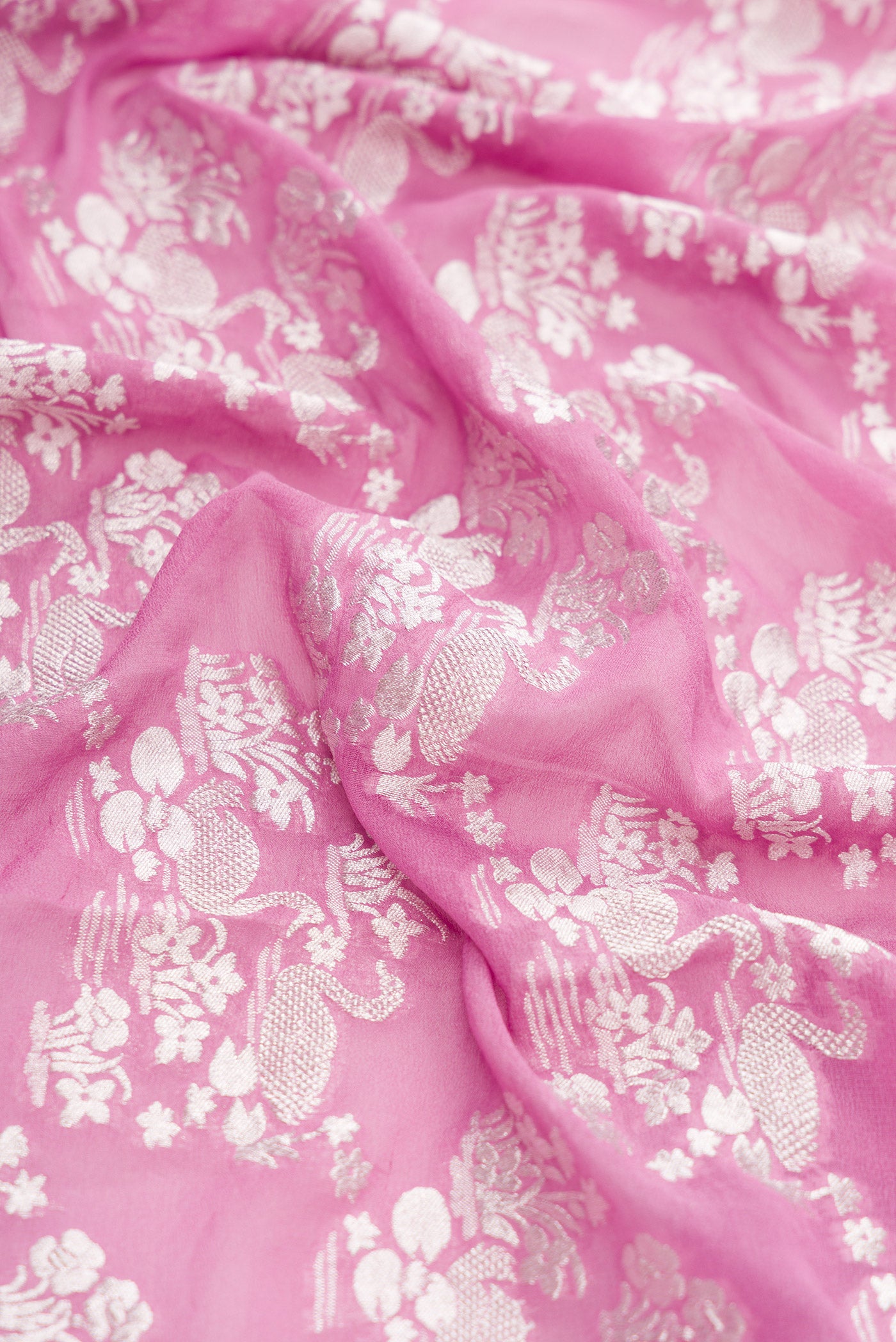 Close up of Lavender Dual Tone Mysore Georgette Saree with Zari Brocade on the body and Zari Border.  displaying folds