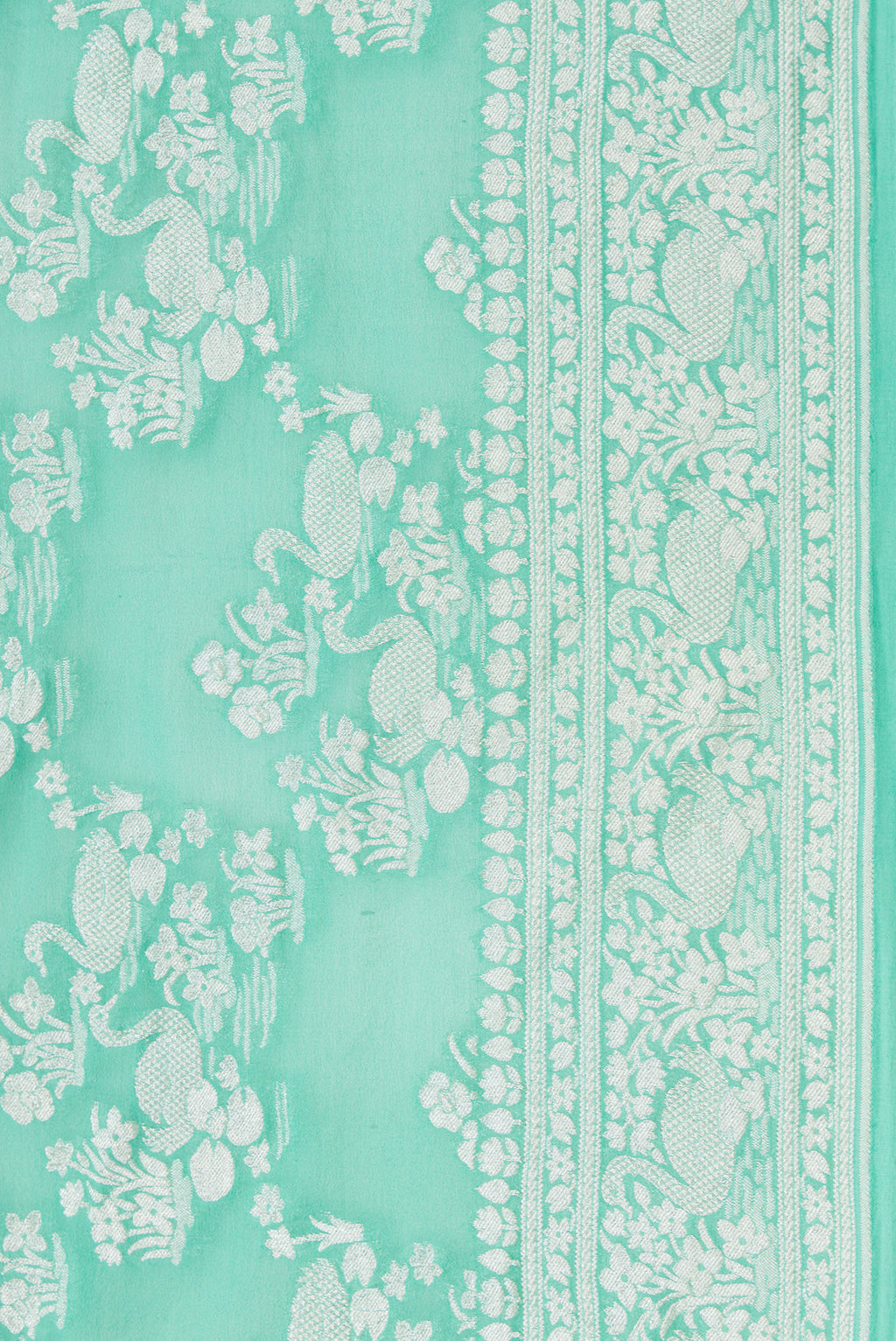 Border image of Sea Green Dual Tone Mysore Georgette Saree with Zari Brocade on the body and Zari Border. 