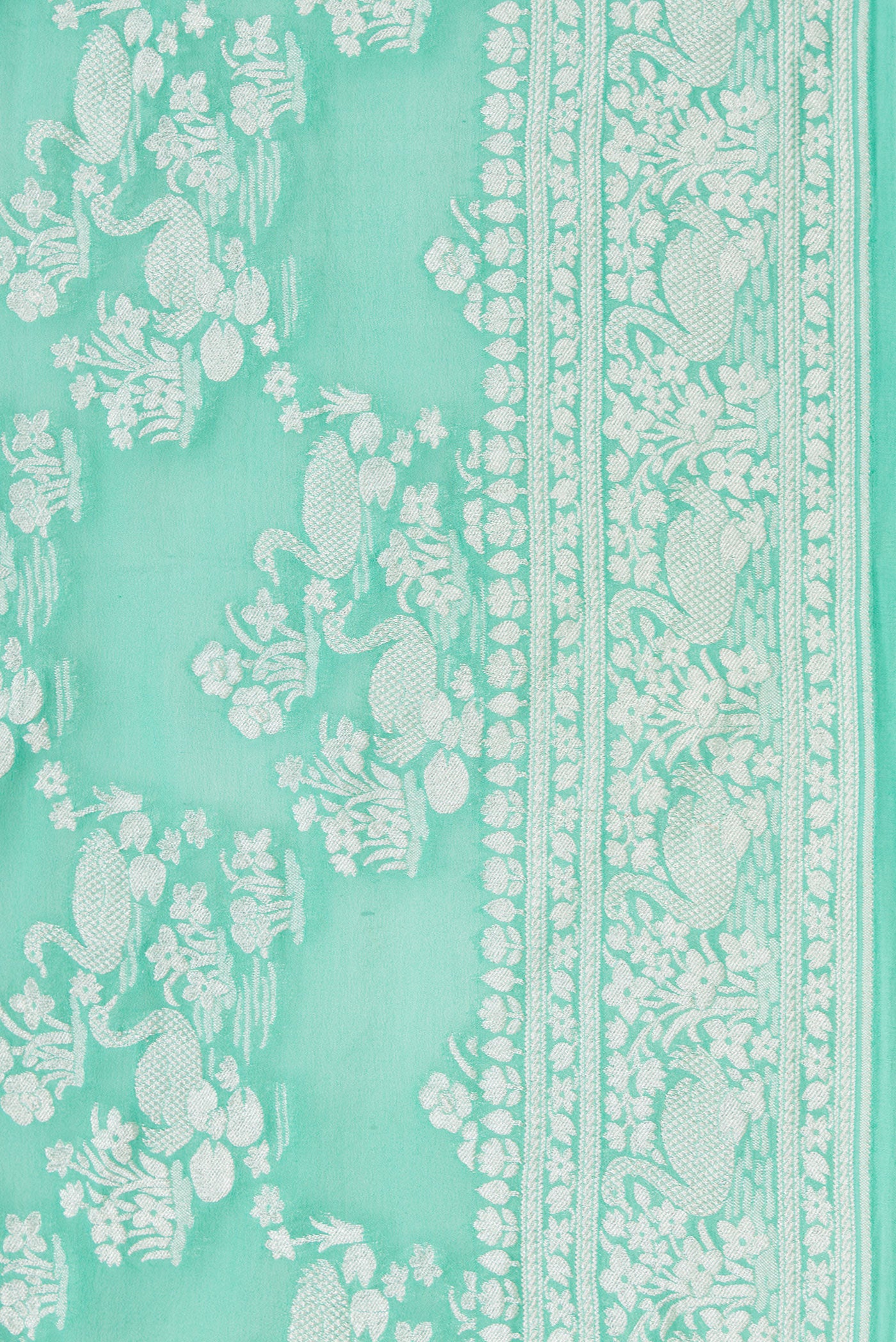 Border image of Sea Green Dual Tone Mysore Georgette Saree with Zari Brocade on the body and Zari Border. 