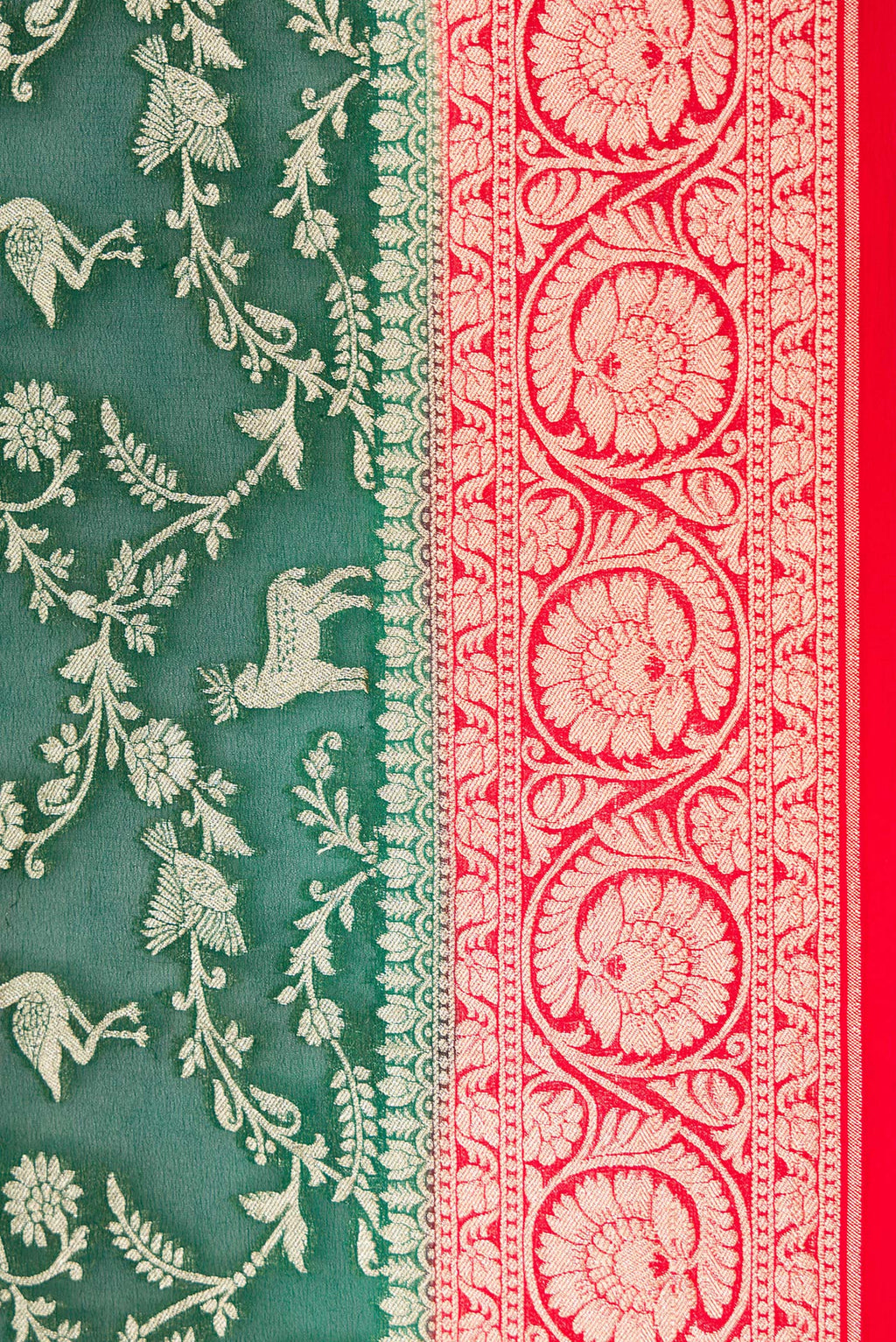 Border image of Bottle Green Dual Tone Mysore Georgette Saree with Zari Brocade on the body and Zari Border. 
