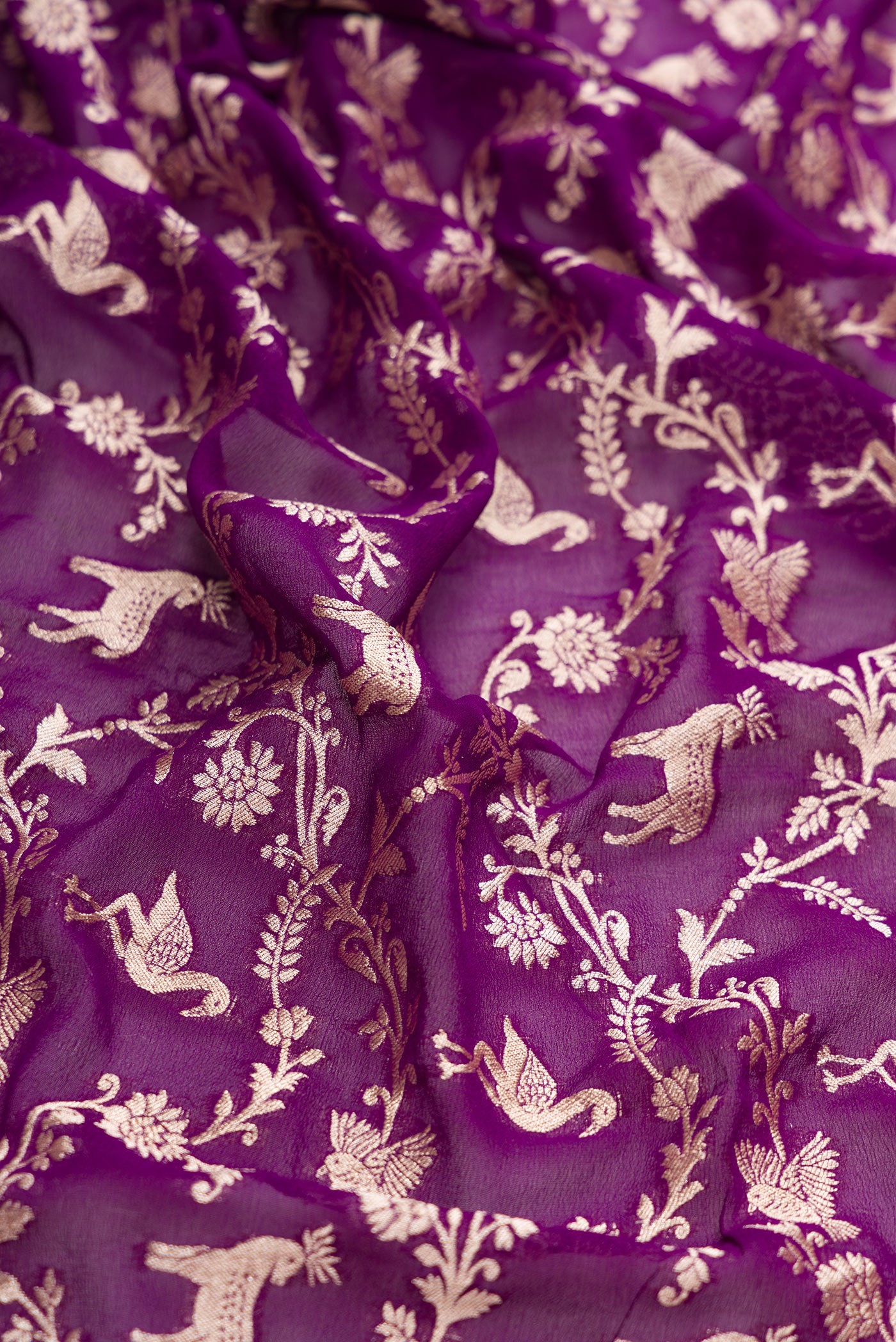 Close up of Royal Blue Dual Tone Mysore Georgette Saree with Zari Brocade on the body and Zari Border.  displaying folds