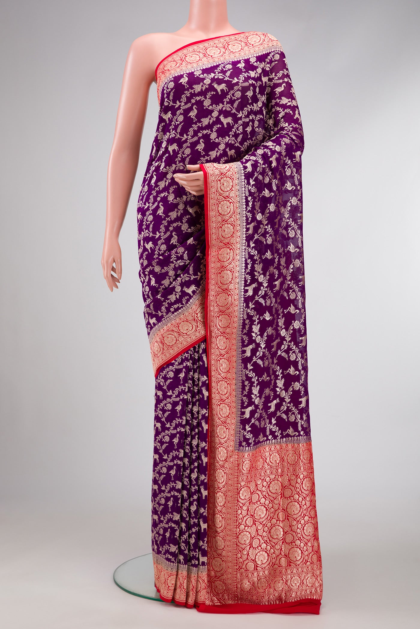 Royal Blue Dual Tone Mysore Georgette Saree with Zari Brocade on the body and Zari Border.  displayed on a mannequin