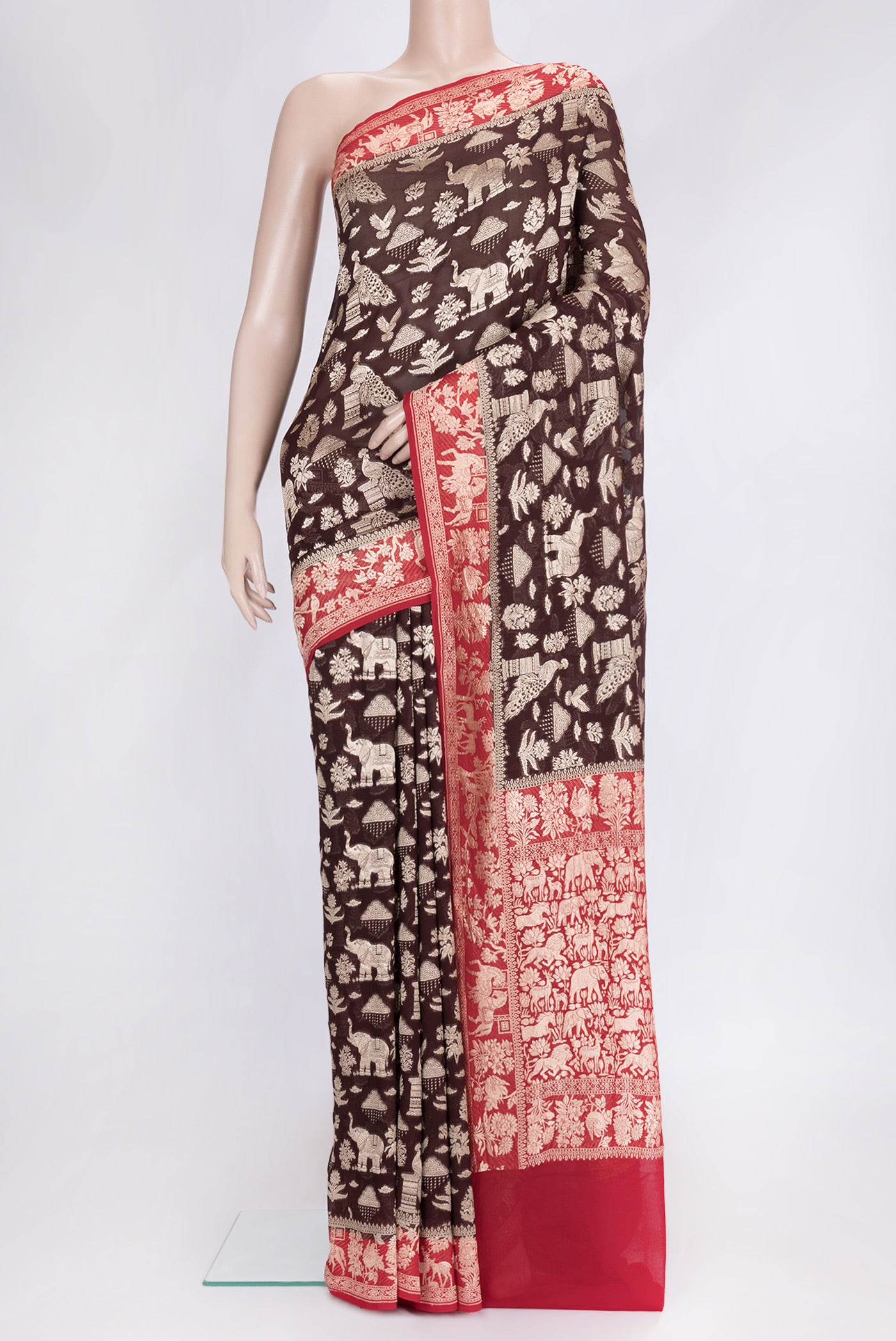 Brown Dual Tone Banarasi Georgette Saree with Zari Brocade on the body and Zari Border.  displayed on a mannequin