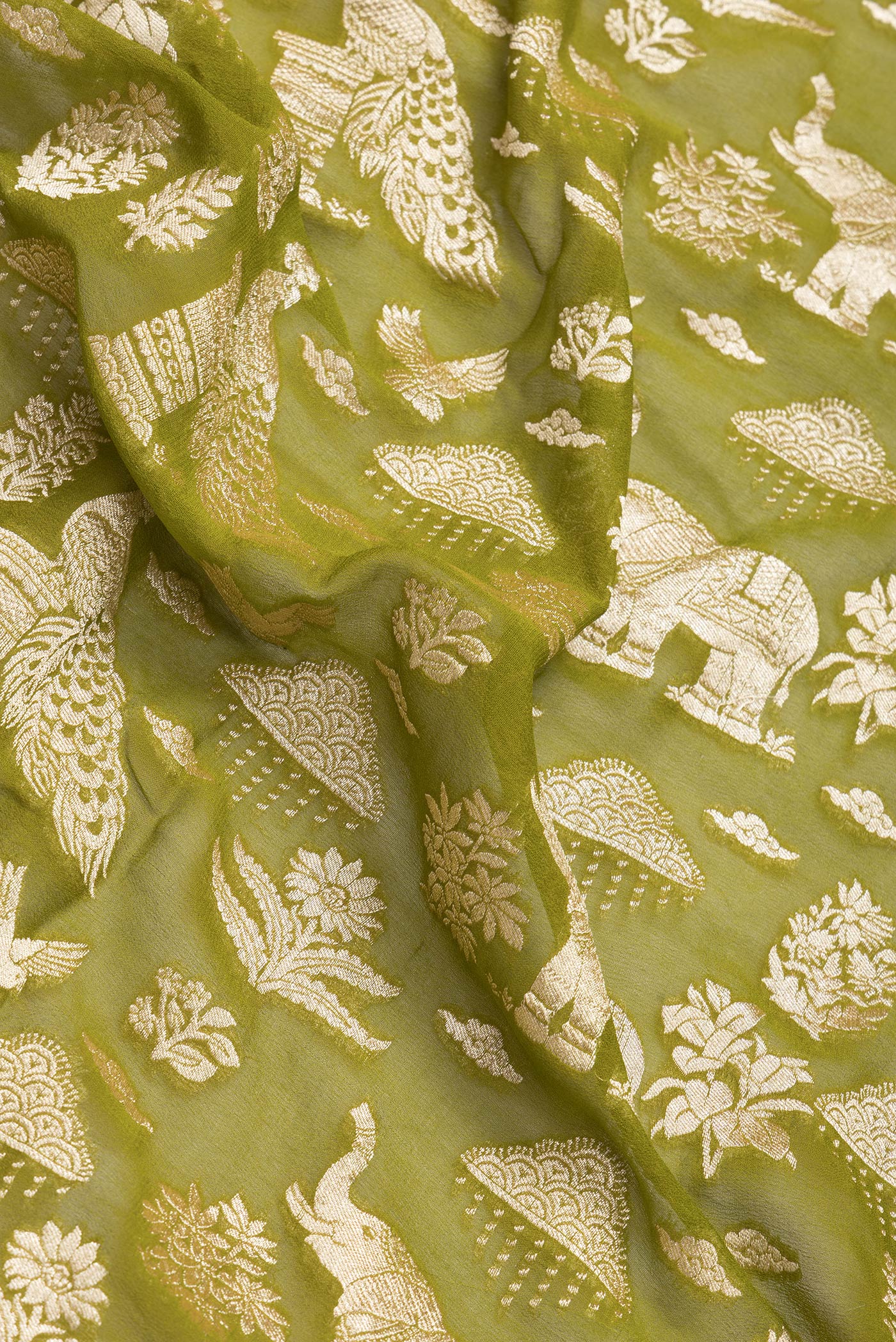 Close up of Mehandi Green Dual Tone Banarasi Georgette Saree with Zari Brocade on the body and Fancy Border.  displaying folds