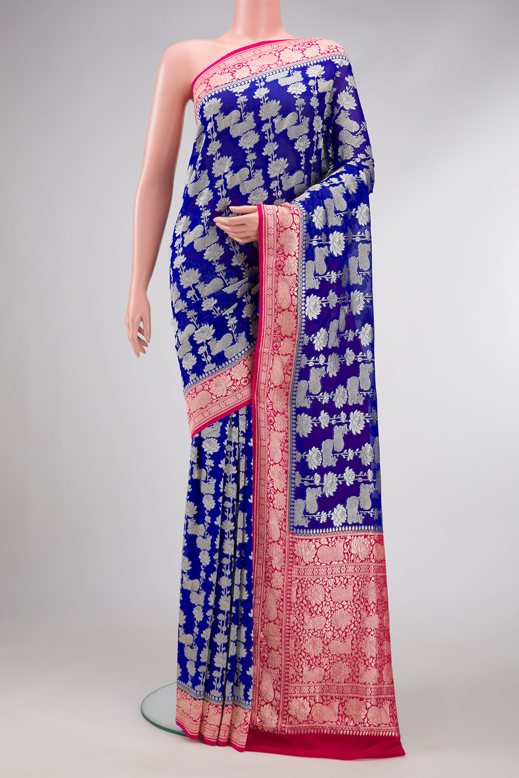 Royal Blue Dual Tone Mysore Georgette Saree with Zari Brocade on the body and Zari Border.  displayed on a mannequin