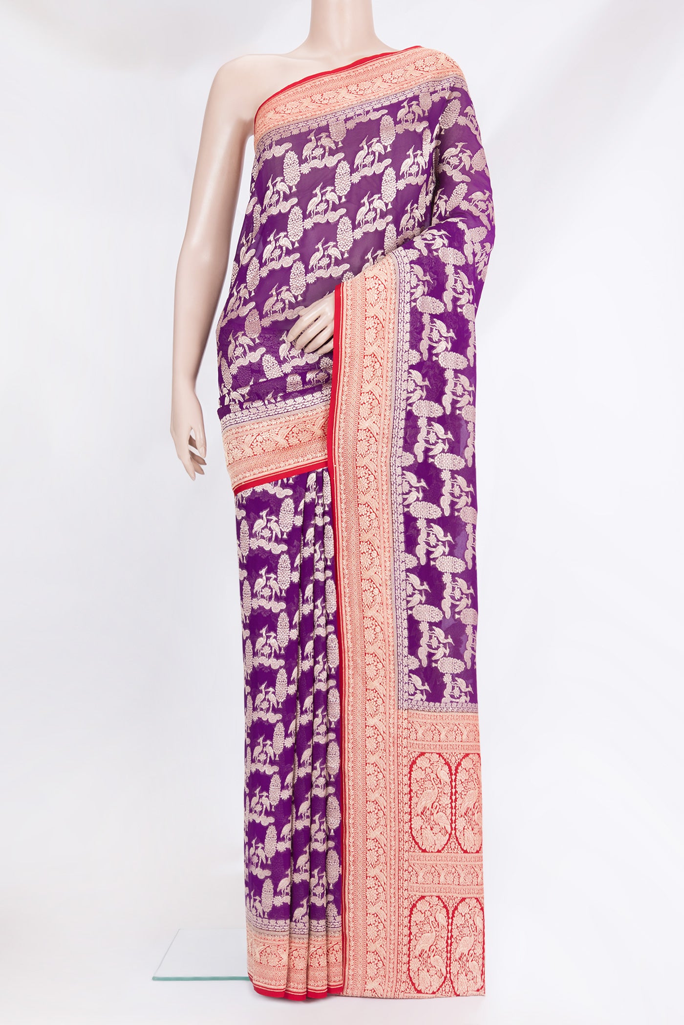 Violet Banarasi Georgette Saree with Zari Brocade on the body and Zari Border.  displayed on a mannequin