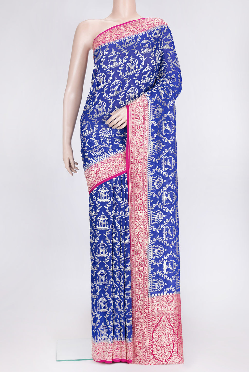 Royal Blue Dual Tone Banarasi Georgette Saree with Zari Brocade on the body and Zari Border.  displayed on a mannequin