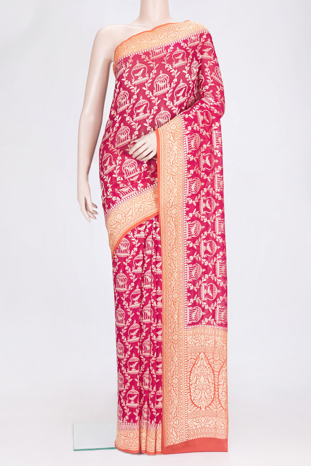 Pink Dual Tone Banarasi Georgette Saree with Zari Brocade on the body and Zari Border.  displayed on a mannequin