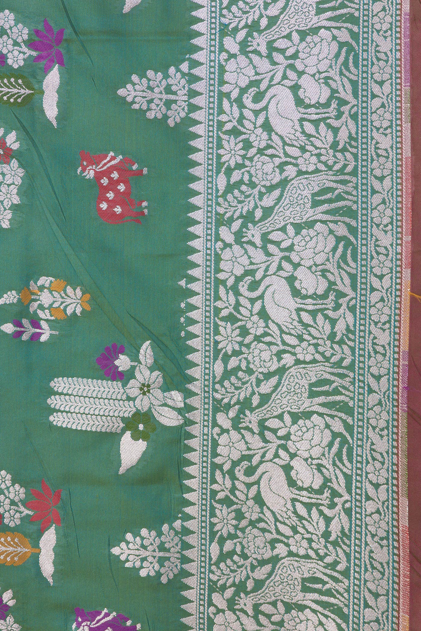 Border image of Green Dual Tone Blended Banarasi Silk Saree with Zari Brocade on the body and Zari Border. 