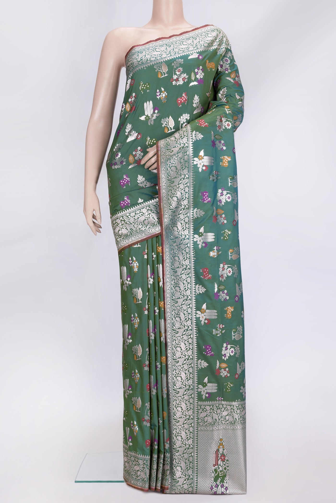Green Dual Tone Blended Banarasi Silk Saree with Zari Brocade on the body and Zari Border.  displayed on a mannequin