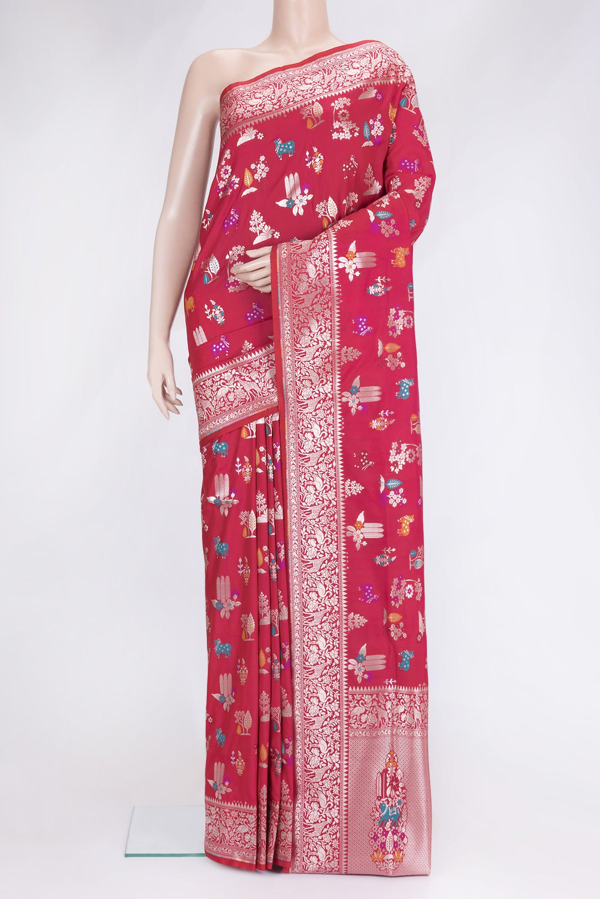 Dark Pink Dual Tone Blended Banarasi Silk Saree with Zari And Thread Butta on the body and Zari Border.  displayed on a mannequin