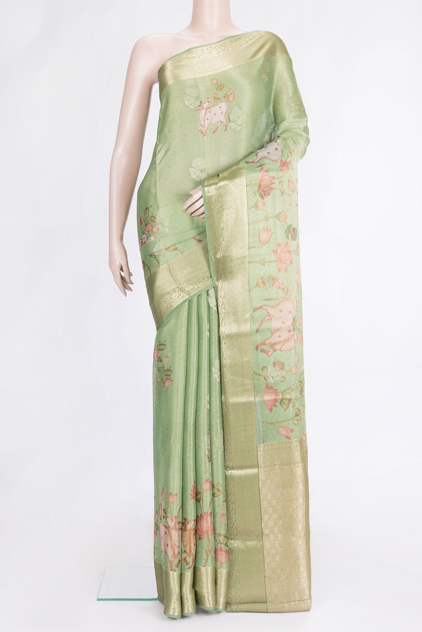 Pista Green Dual Tone Mysore Silk Saree with Zari Brocade on the body and Zari Border.  displayed on a mannequin