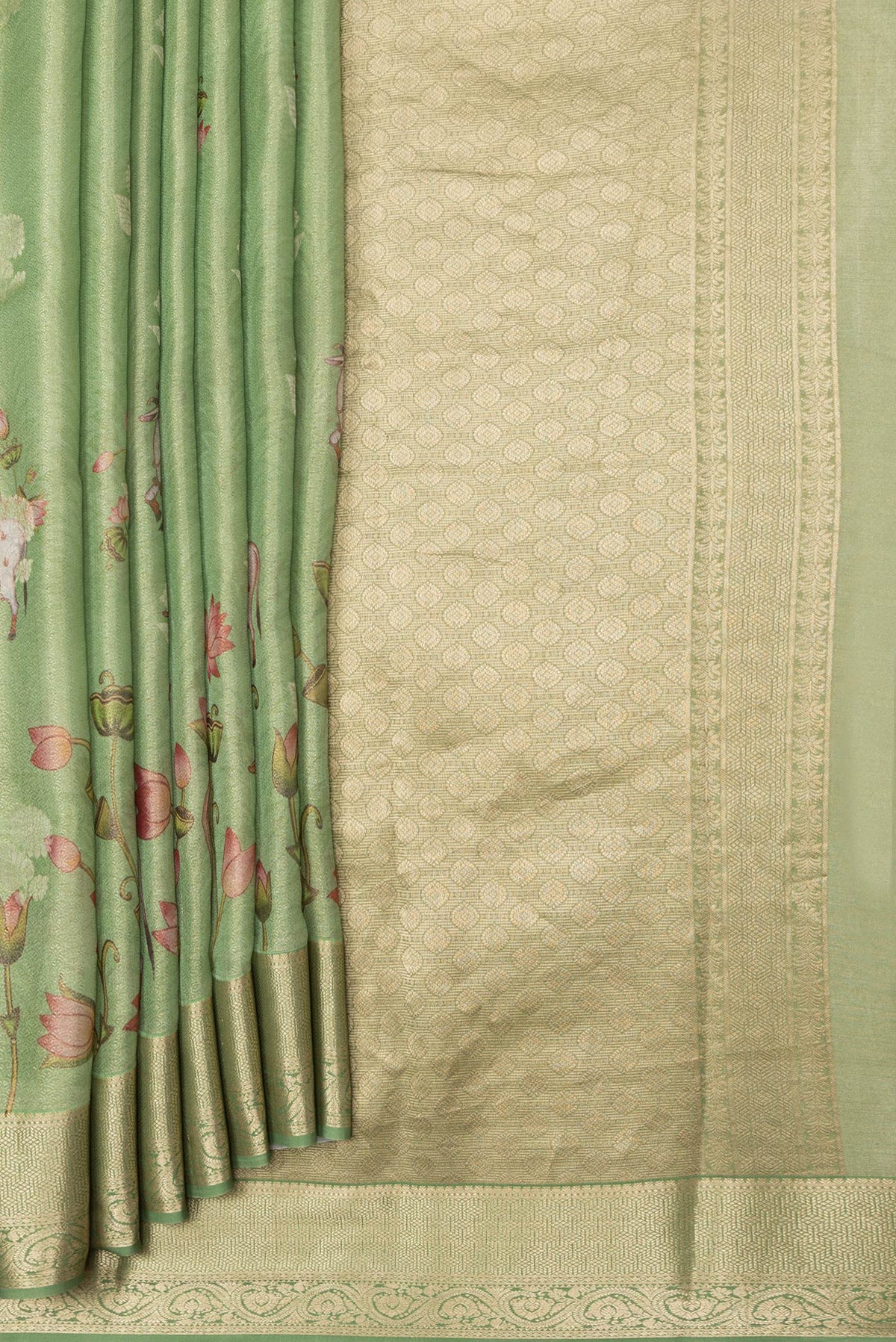 Pleats and pallu of Pista Green Dual Tone Mysore Silk Saree with Zari Brocade on the body and Zari Border. 