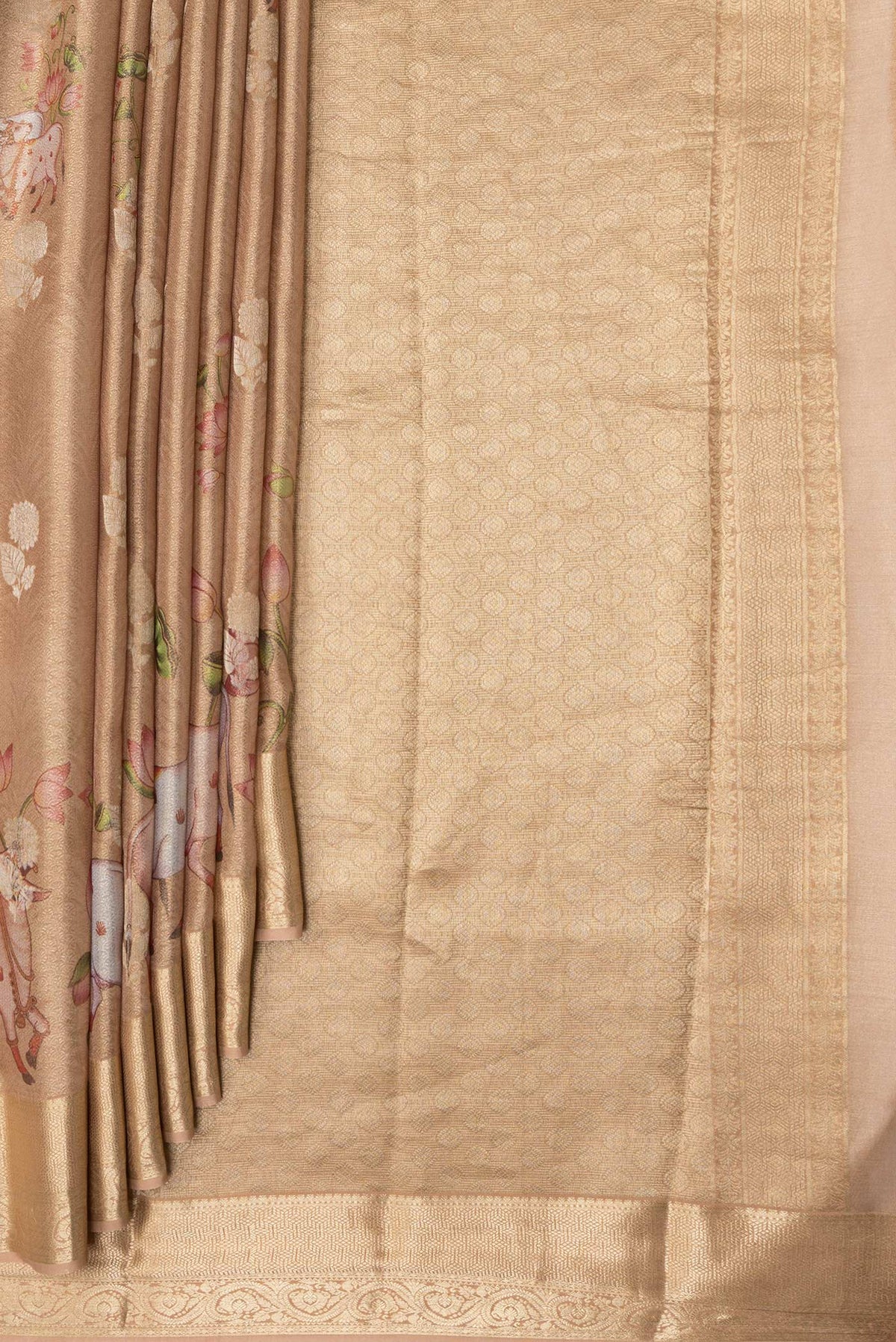 Pleats and pallu of Gold Dual Tone Mysore Silk Saree with Zari Brocade on the body and Fancy Border. 