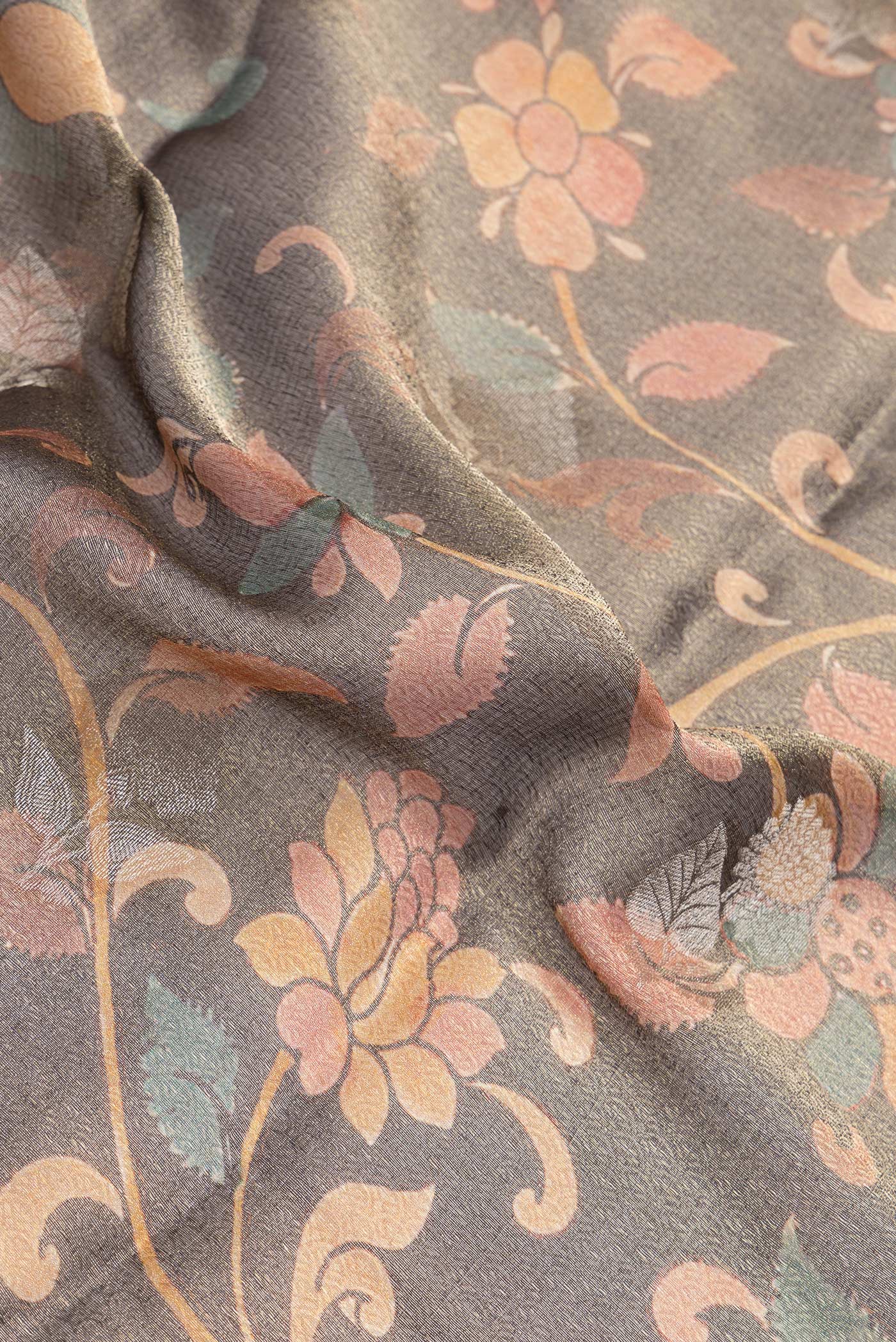 Close up of Brown Dual Tone Mysore Silk Saree with Zari Brocade on the body and Zari Border.  displaying folds